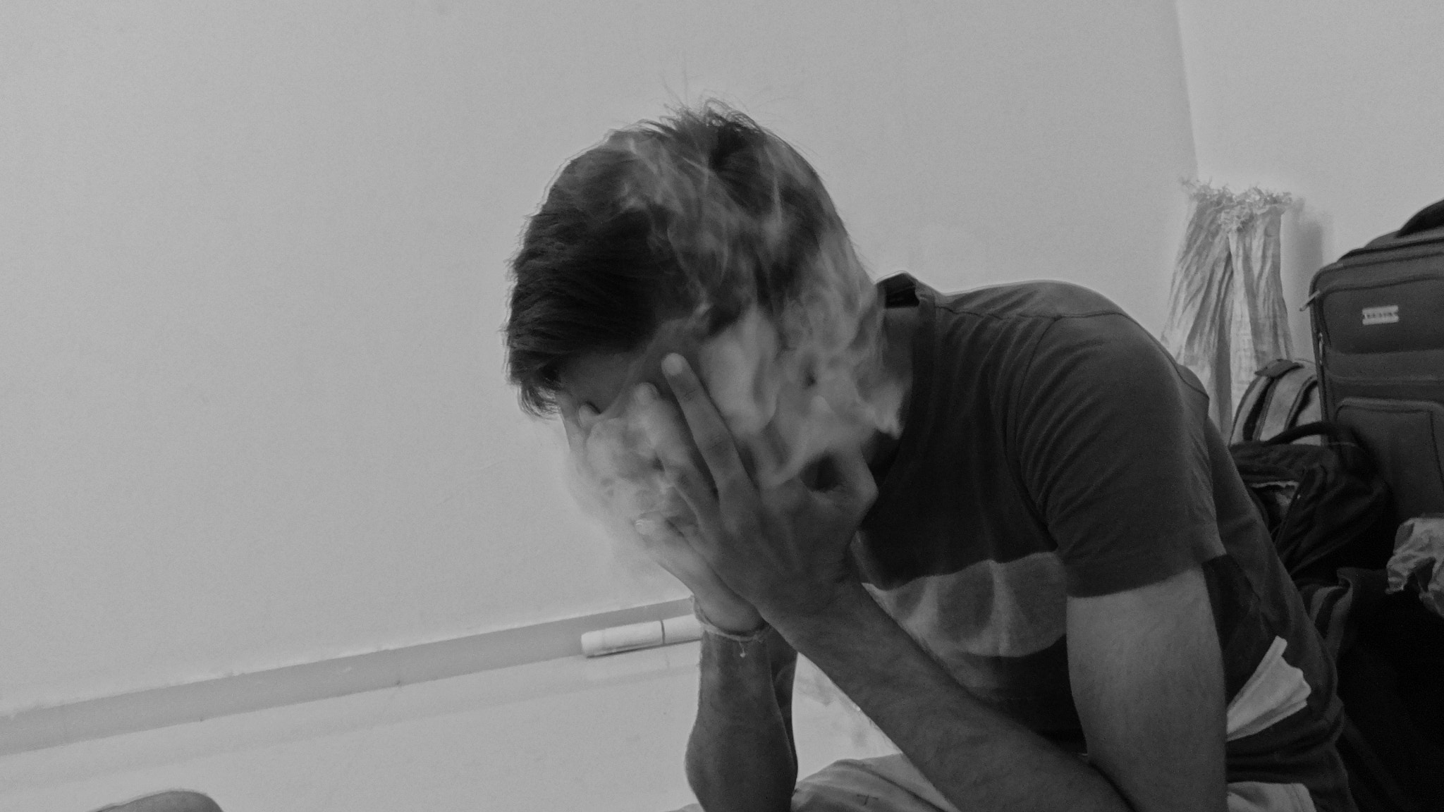 Sony DSC-WX60 sample photo. Sadness smoke  photography