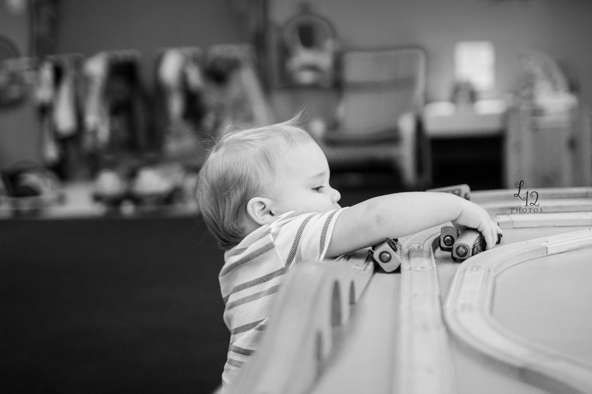 Canon EF 35mm F1.4L USM sample photo. A boy and his train photography