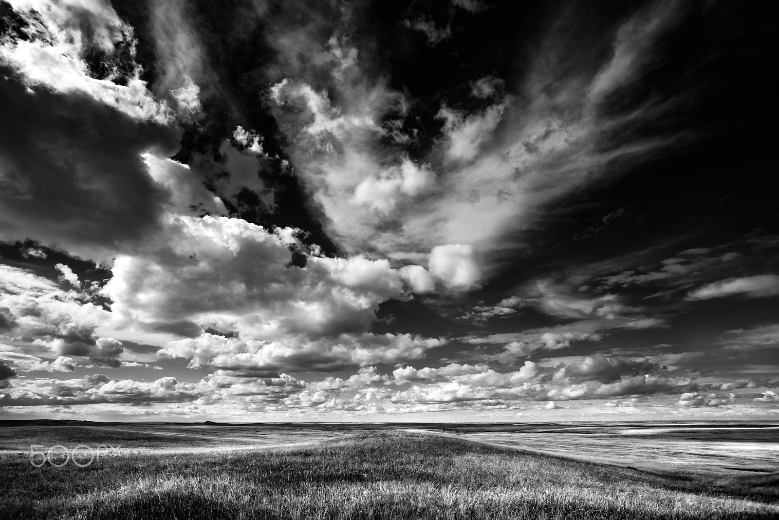 Sony a7R II + Voigtlander SUPER WIDE-HELIAR 15mm F4.5 III sample photo. Clouds over the badlands photography