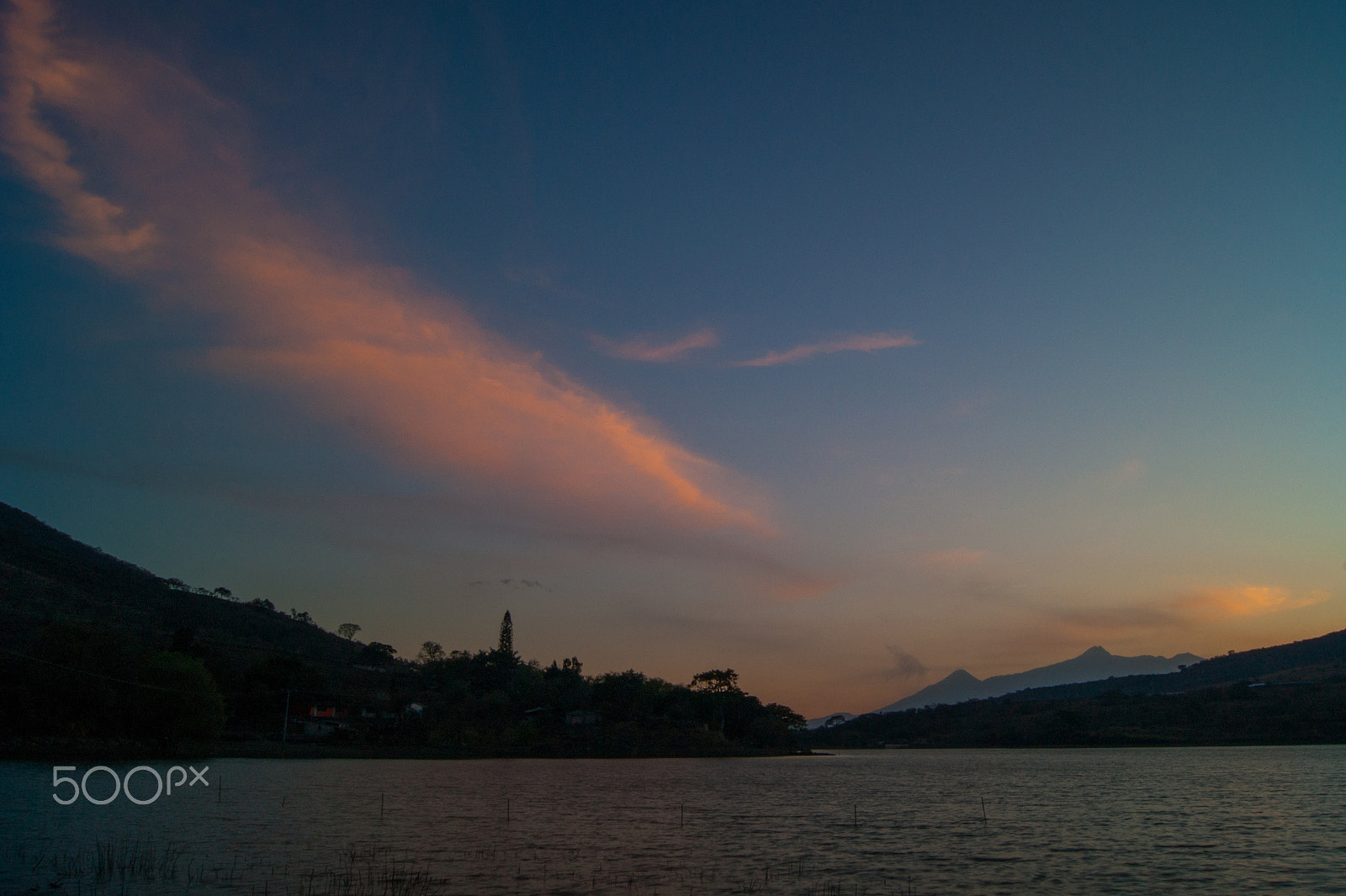 Sony Alpha DSLR-A380 sample photo. Diagonal clouds over the lake photography