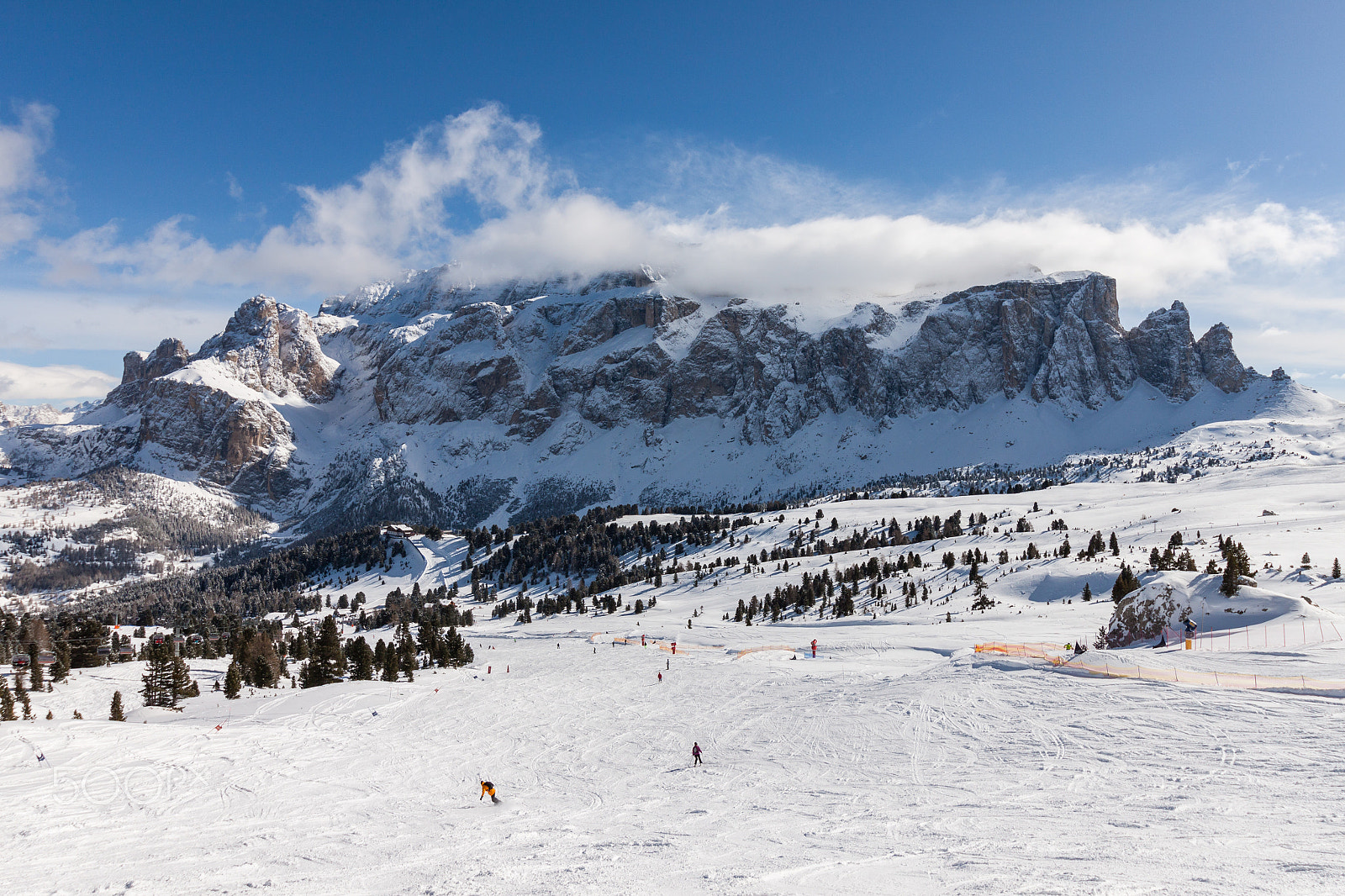 Canon EOS 500D (EOS Rebel T1i / EOS Kiss X3) + Canon EF-S 10-18mm F4.5–5.6 IS STM sample photo. View of the sella group with snow in the italian dolomites from the ski area photography