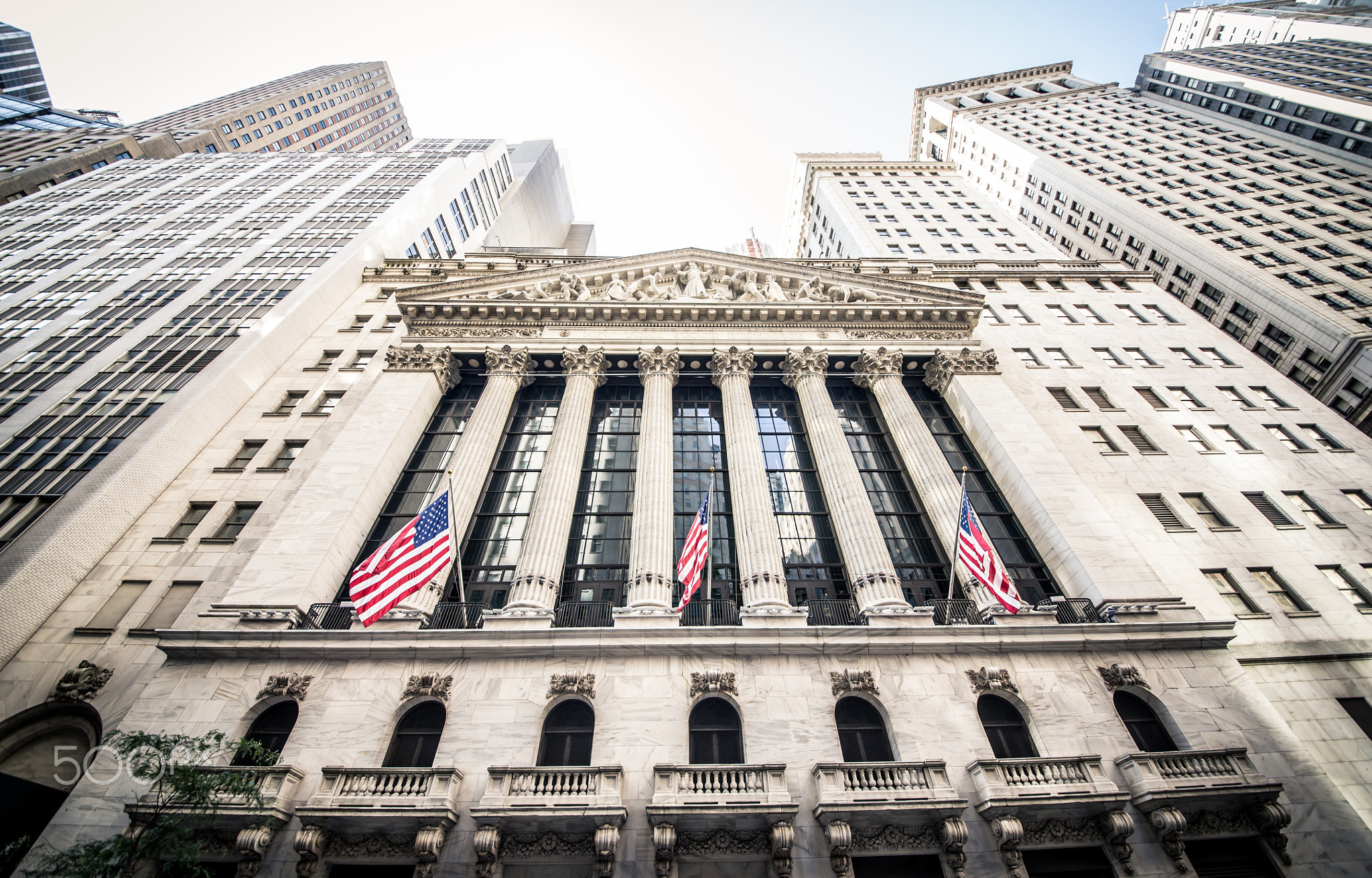 NEW YORK CITY, NY ,SEPTEMBER 17, 2015: The main building of New York Stock Exchange and a part of...