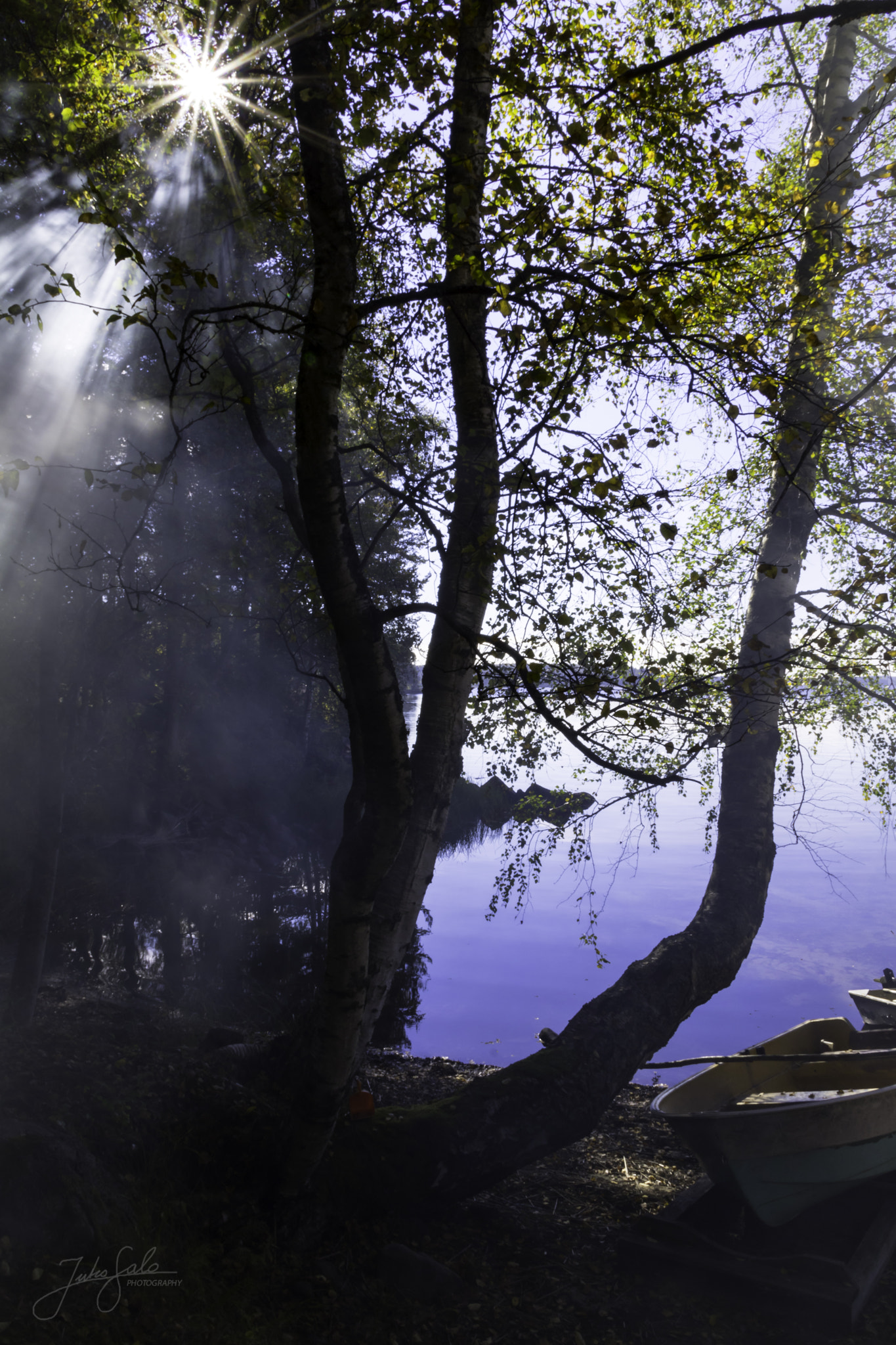 Canon EF 75-300mm F4.0-5.6 IS USM sample photo. Sunbeams coming through smoke. photography