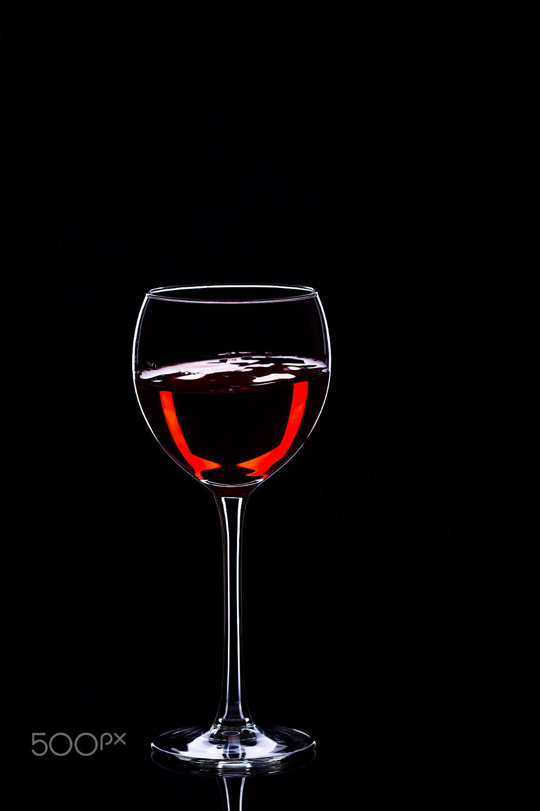 Canon EOS-1D Mark IV + Canon EF 100mm F2.8L Macro IS USM sample photo. Wine glasses with wine bottle on a black background, minimalism, photography