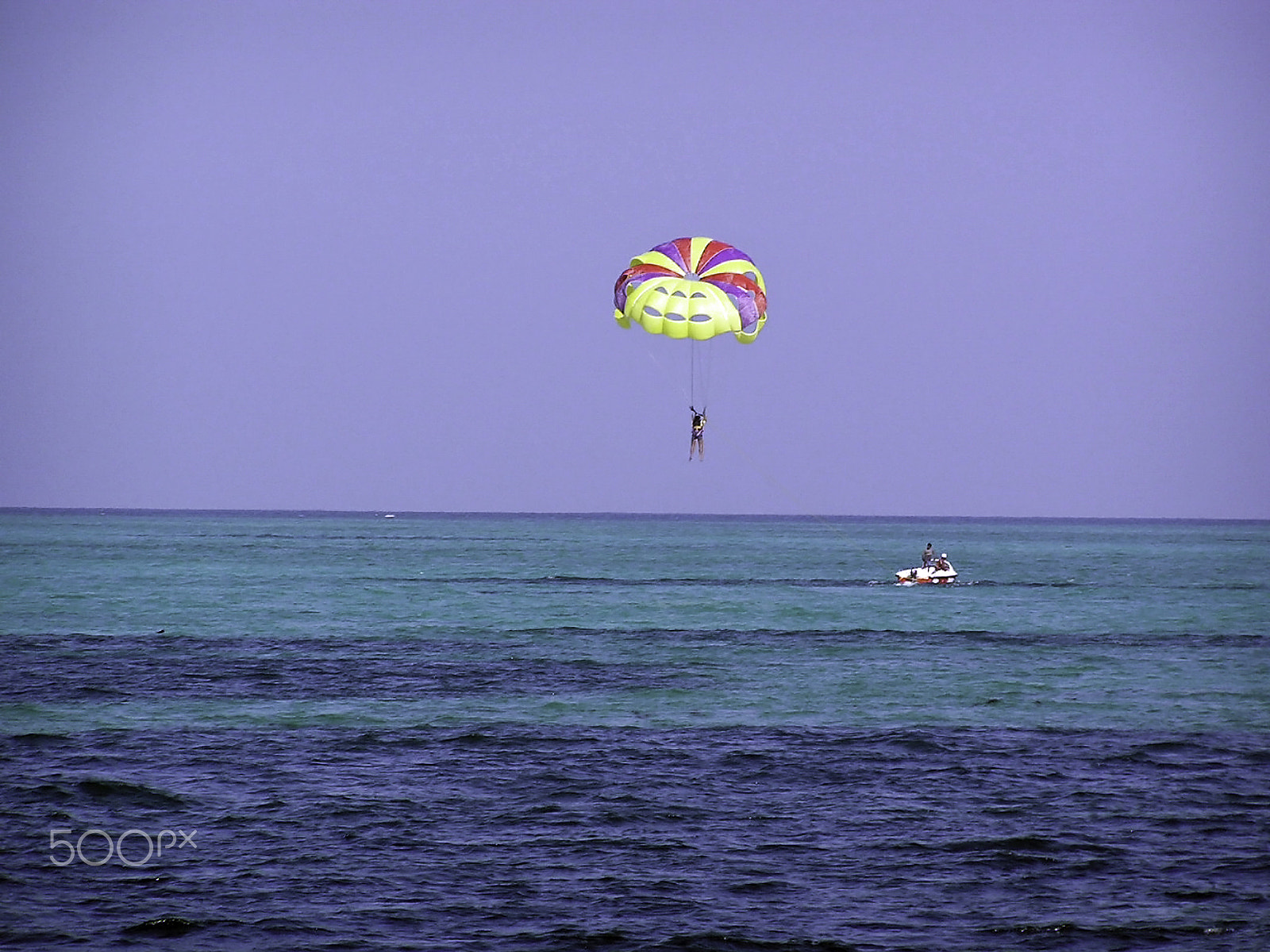 Olympus C750UZ sample photo. Preparing to land in the water after para-sailing in the lakshad photography