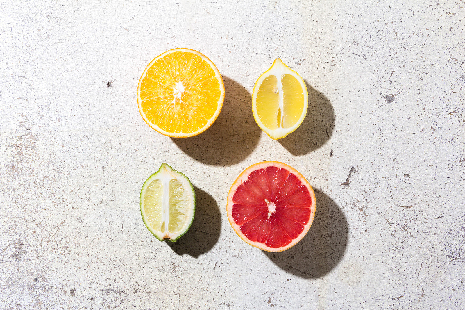 Canon EOS 60D + Tamron AF 28-75mm F2.8 XR Di LD Aspherical (IF) sample photo. Different kinds of citrus on white background photography