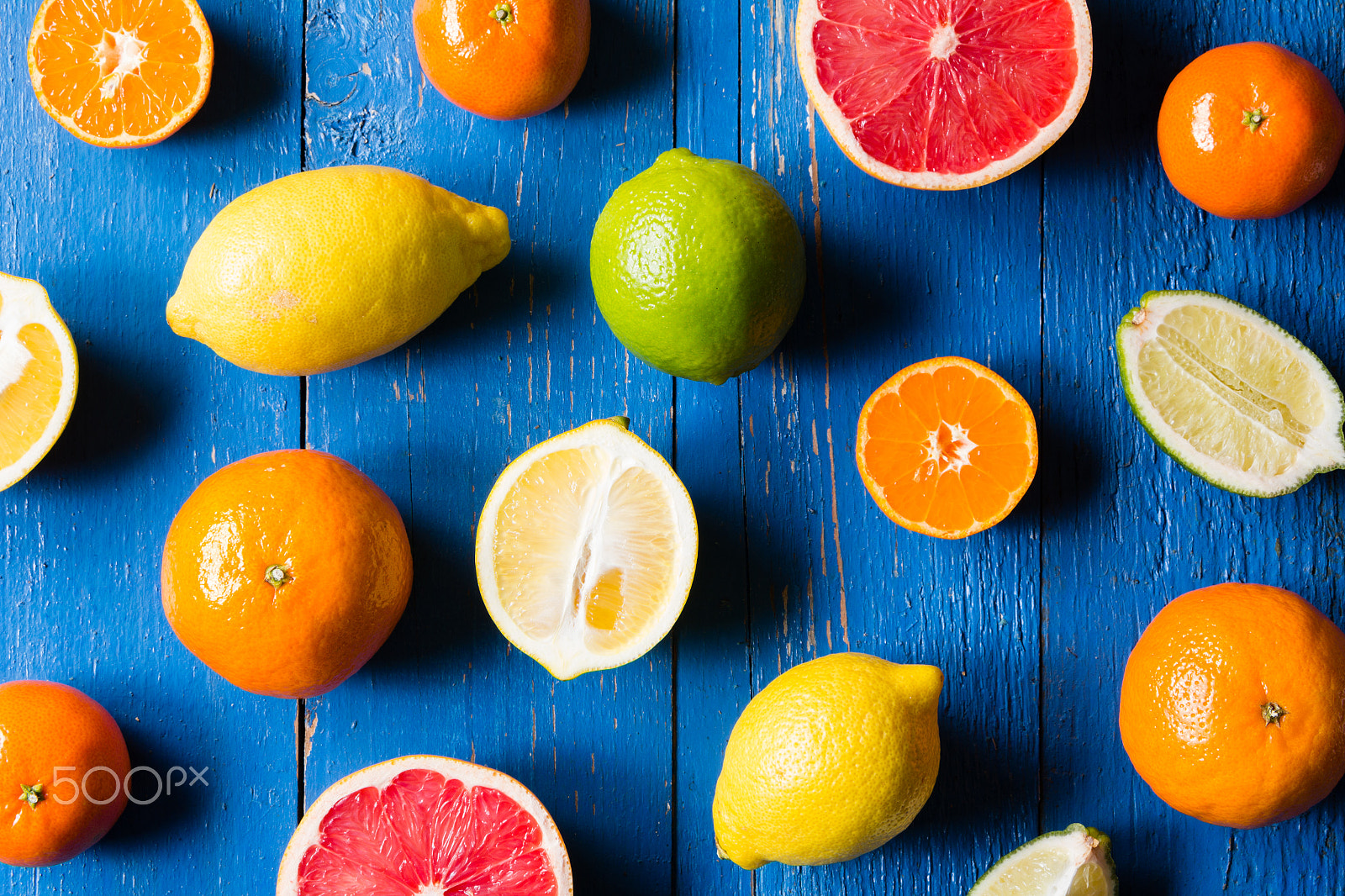 Canon EOS 60D + Tamron AF 28-75mm F2.8 XR Di LD Aspherical (IF) sample photo. Various types of citrus fruit on a blue painted wooden background photography