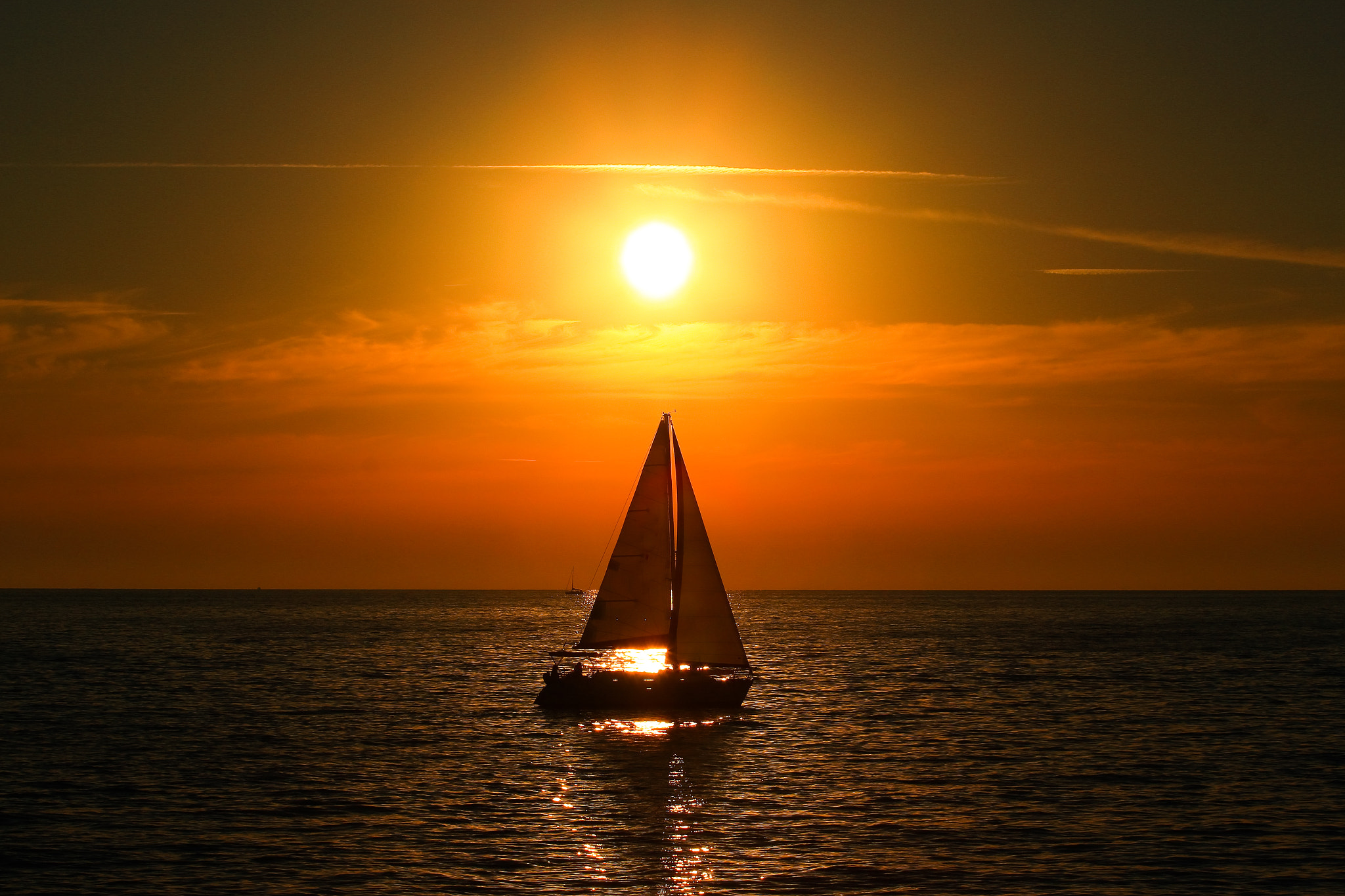 Canon EOS 600D (Rebel EOS T3i / EOS Kiss X5) + Canon EF 70-200mm F4L USM sample photo. Sailing at sunset - tel-aviv beach photography