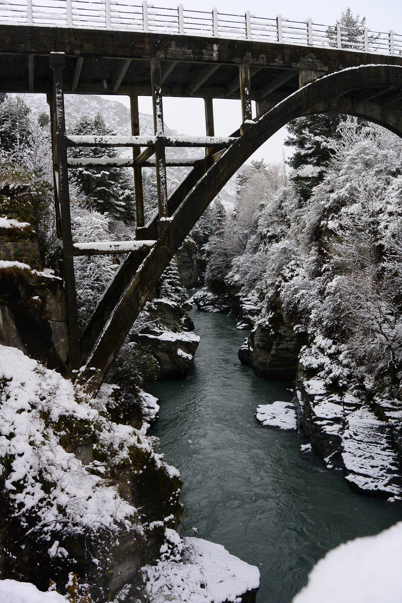 Nikon 1 AW1 sample photo. Shotover jet beach winter under the bridge photography