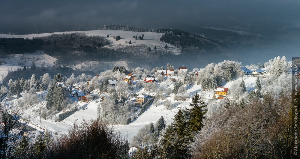 Sony a99 II sample photo. Aerial panoramic view of the little village in mountains. winter photography