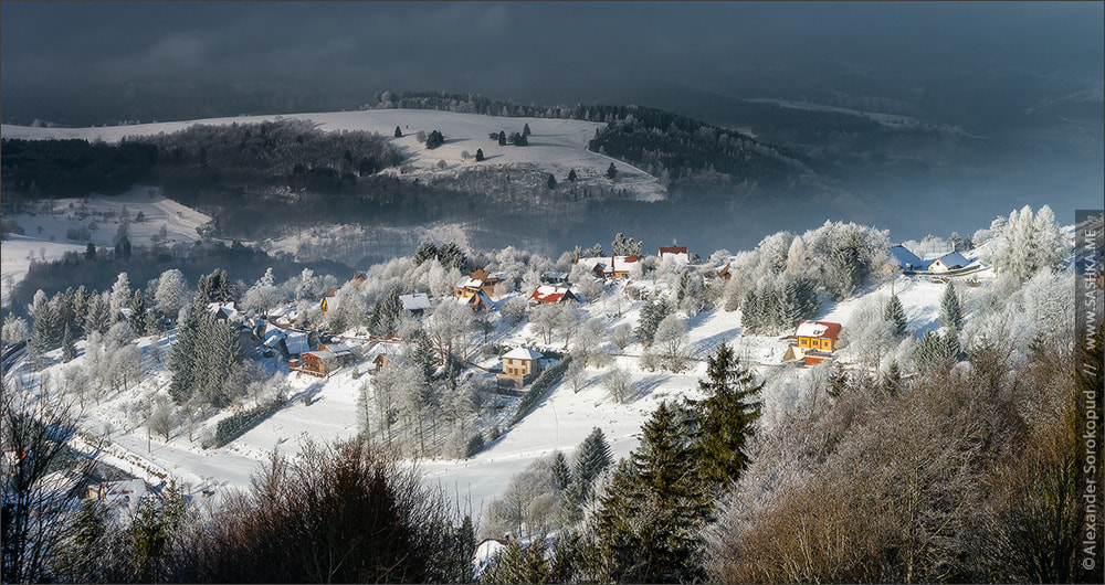 Minolta AF 80-200mm F2.8 HS-APO G sample photo. Aerial panoramic view of the little village in mountains. winter photography