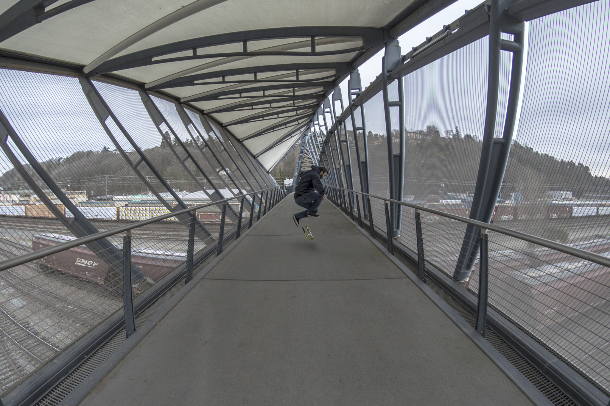 Nikon AF DX Fisheye-Nikkor 10.5mm F2.8G ED sample photo. Helix bridge skateboarding photography