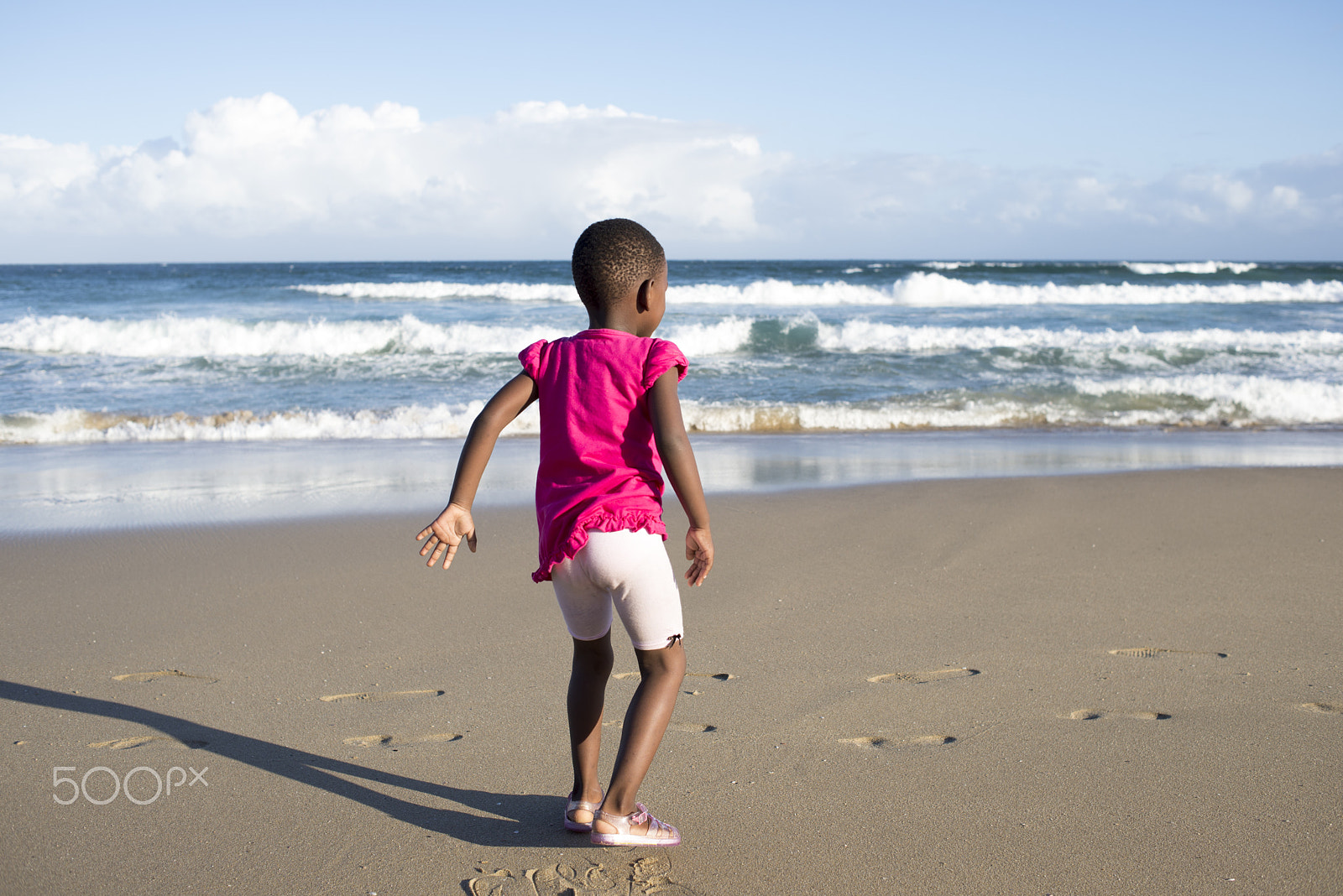 Nikon D600 sample photo. Little girl in pink by the beach photography