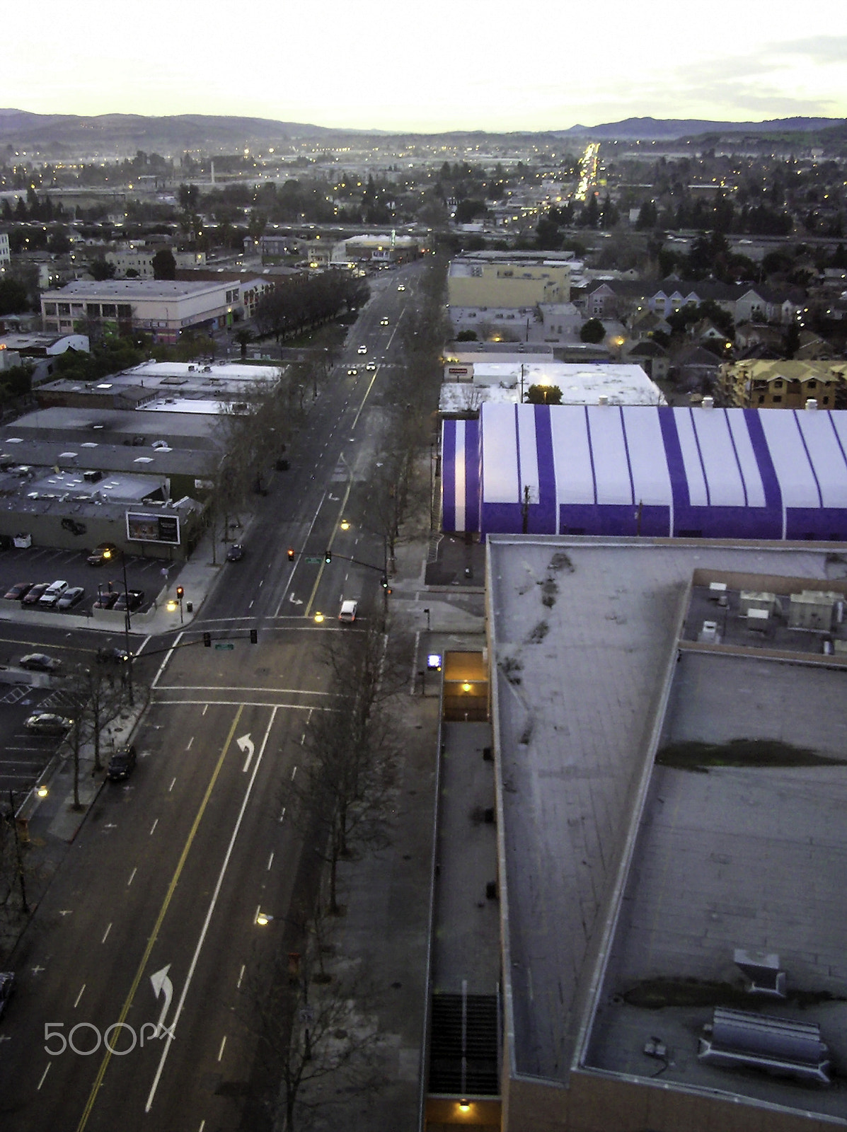 Olympus C750UZ sample photo. A street with vehicles in san jose at dusk photography