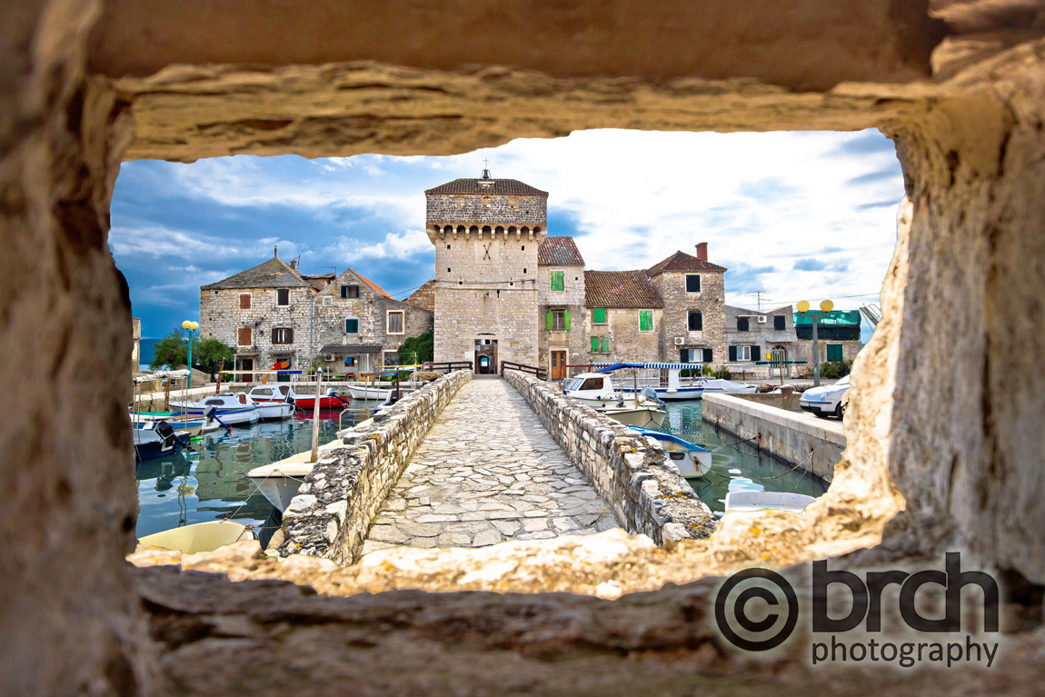 Canon EF-S 10-22mm F3.5-4.5 USM sample photo. Kastel gomilica through stone window view photography