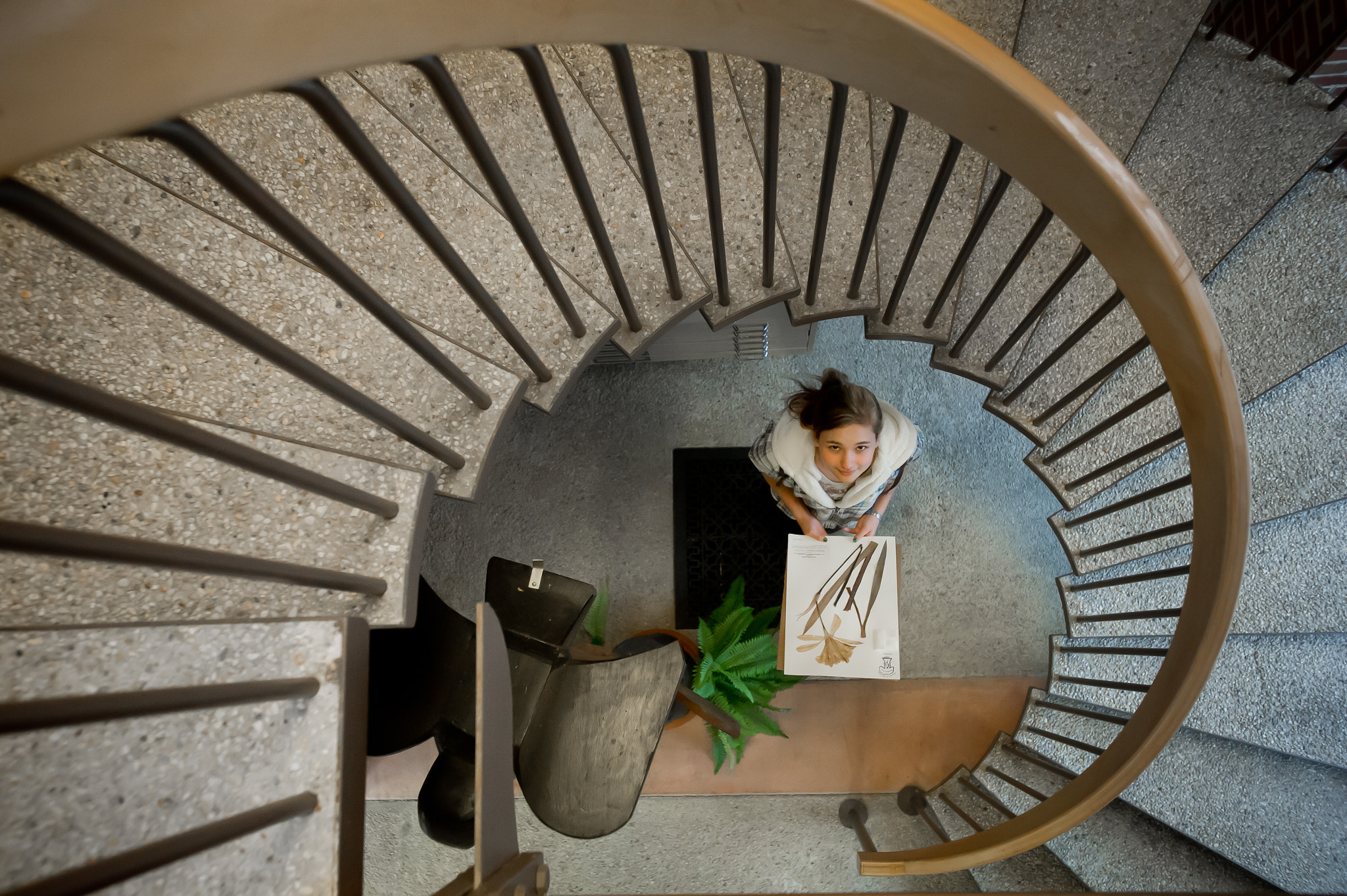 Nikon D3S sample photo. Girl at the bottom of a spiral staircase photography