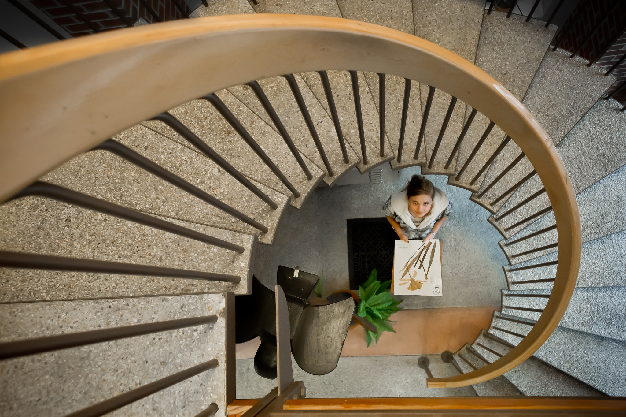 Nikon D3S sample photo. Girl at the bottom of a spiral staircase photography