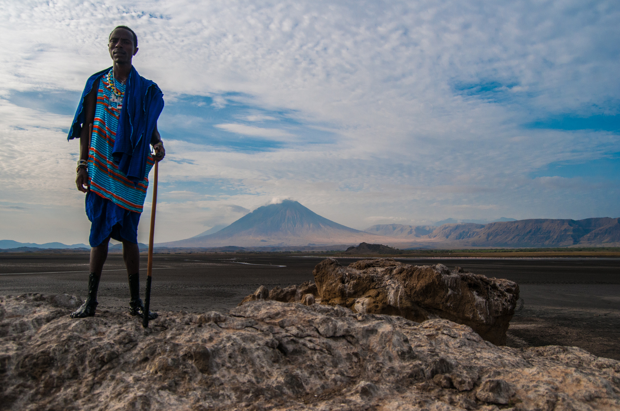 Nikon D300 + Nikon AF-S DX Nikkor 18-55mm F3.5-5.6G II sample photo. Maasai sunya stands tall before the "volcano of god" photography