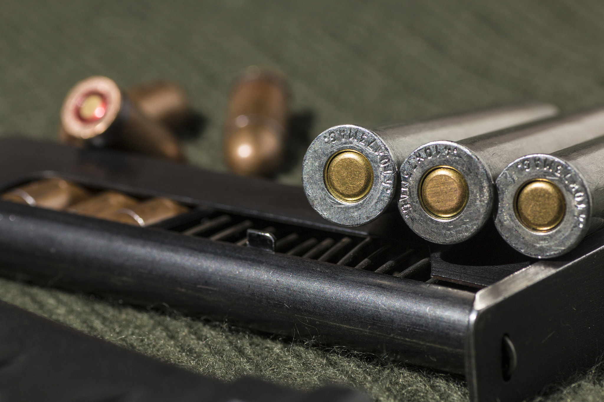 Canon EOS 70D + Tamron SP AF 90mm F2.8 Di Macro sample photo. Rifle and pistol bullets photography