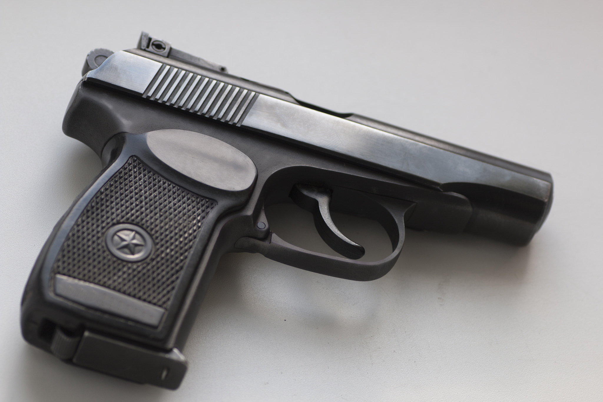 Tamron SP AF 90mm F2.8 Di Macro sample photo. Soviet  makarov gun isolated on white background photography
