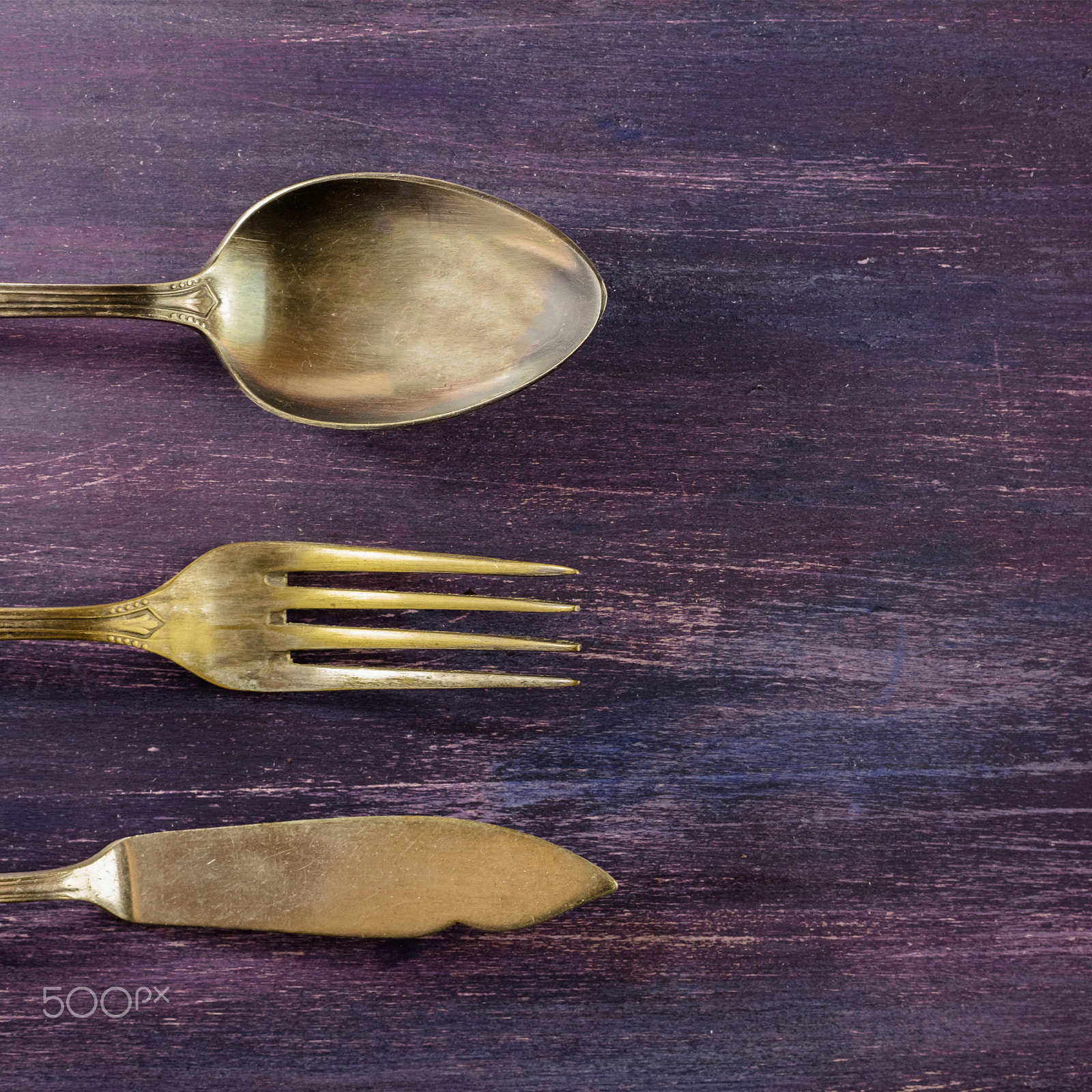 Canon EOS 5DS R sample photo. Vintage fork, knife, and spoon, on purple with copyspace photography