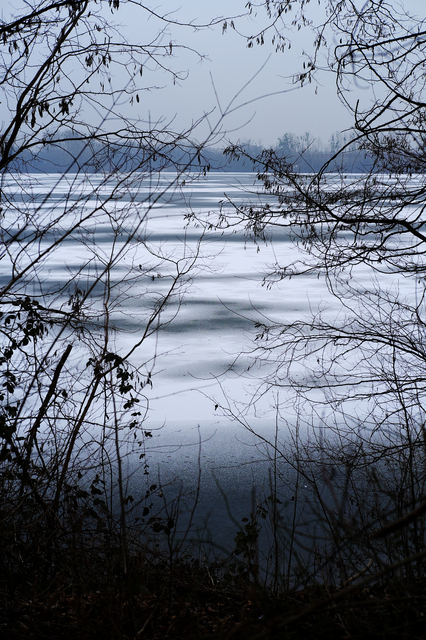 Fujifilm X-E1 + Fujifilm XF 35mm F2 R WR sample photo. Snow on lake 7 photography