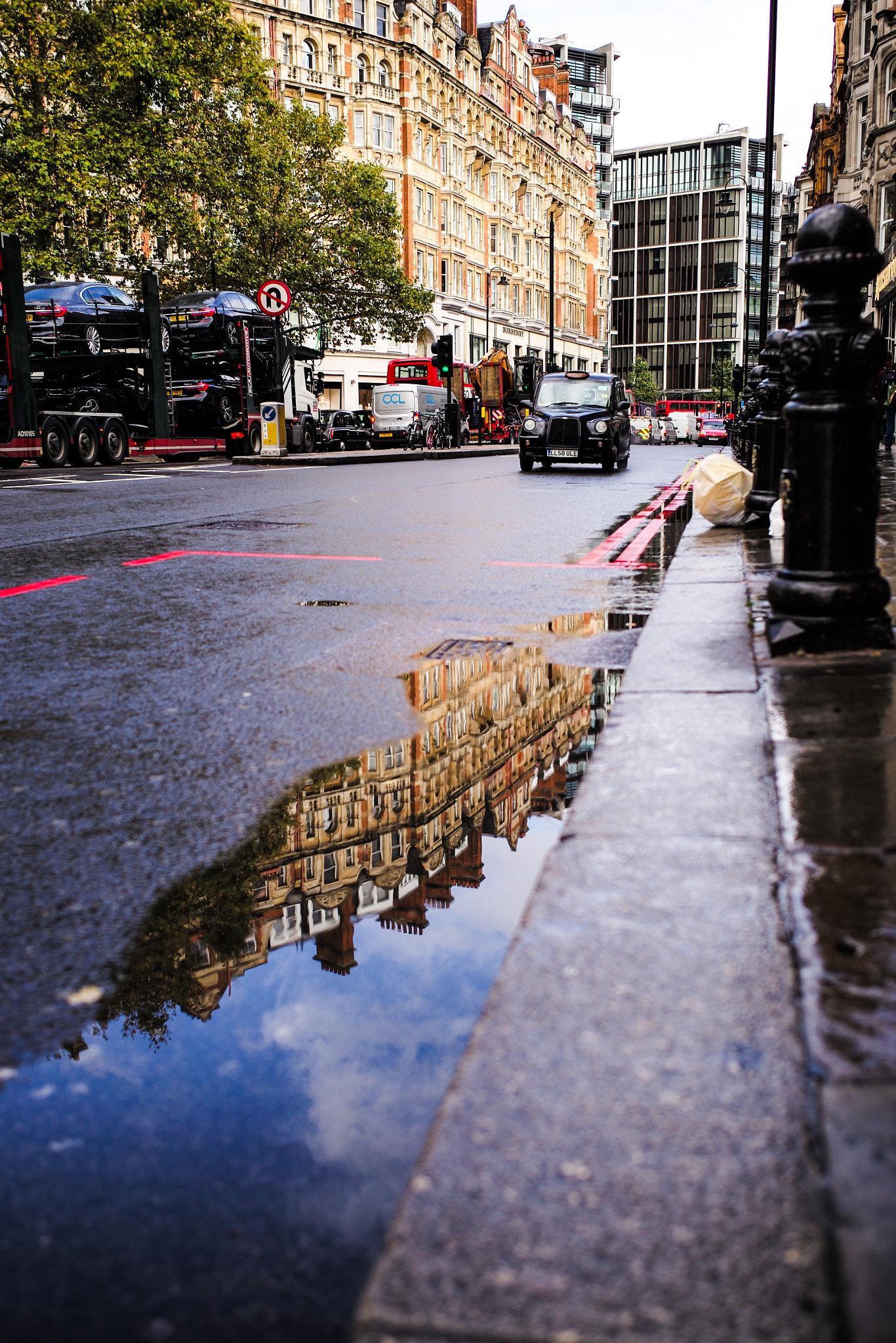 Leica Elmarit-M 28mm F2.8 ASPH sample photo. Reflection after the rain in london photography