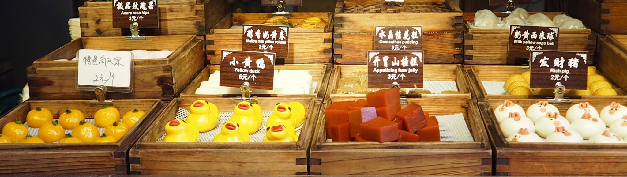 Olympus OM-D E-M10 sample photo. Yellow duck & rich pig - china photography