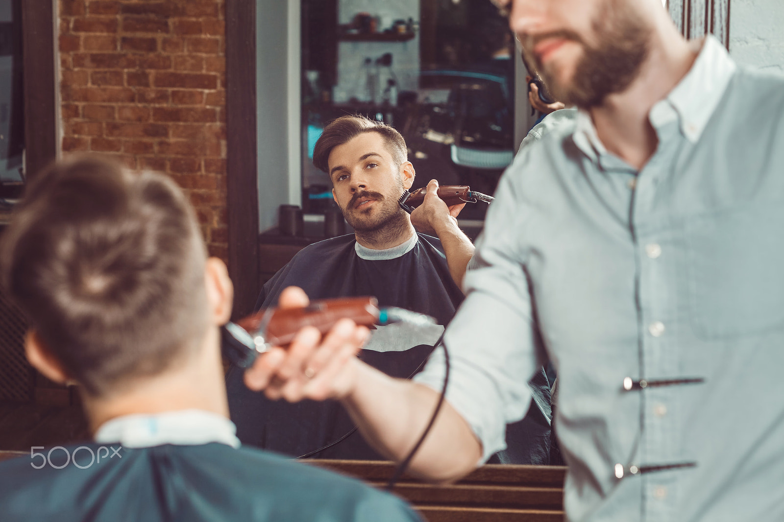Canon EF 100mm F2.0 USM sample photo. Hipster client visiting barber shop photography