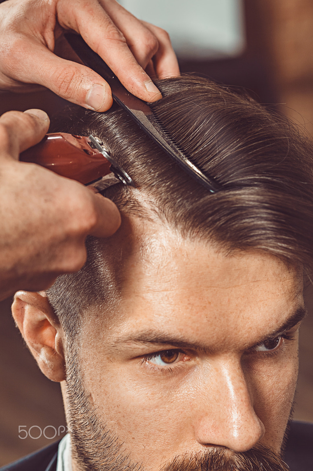 Canon EF 100mm F2.0 USM sample photo. The hands of young barber making haircut to attractive man in barbershop photography