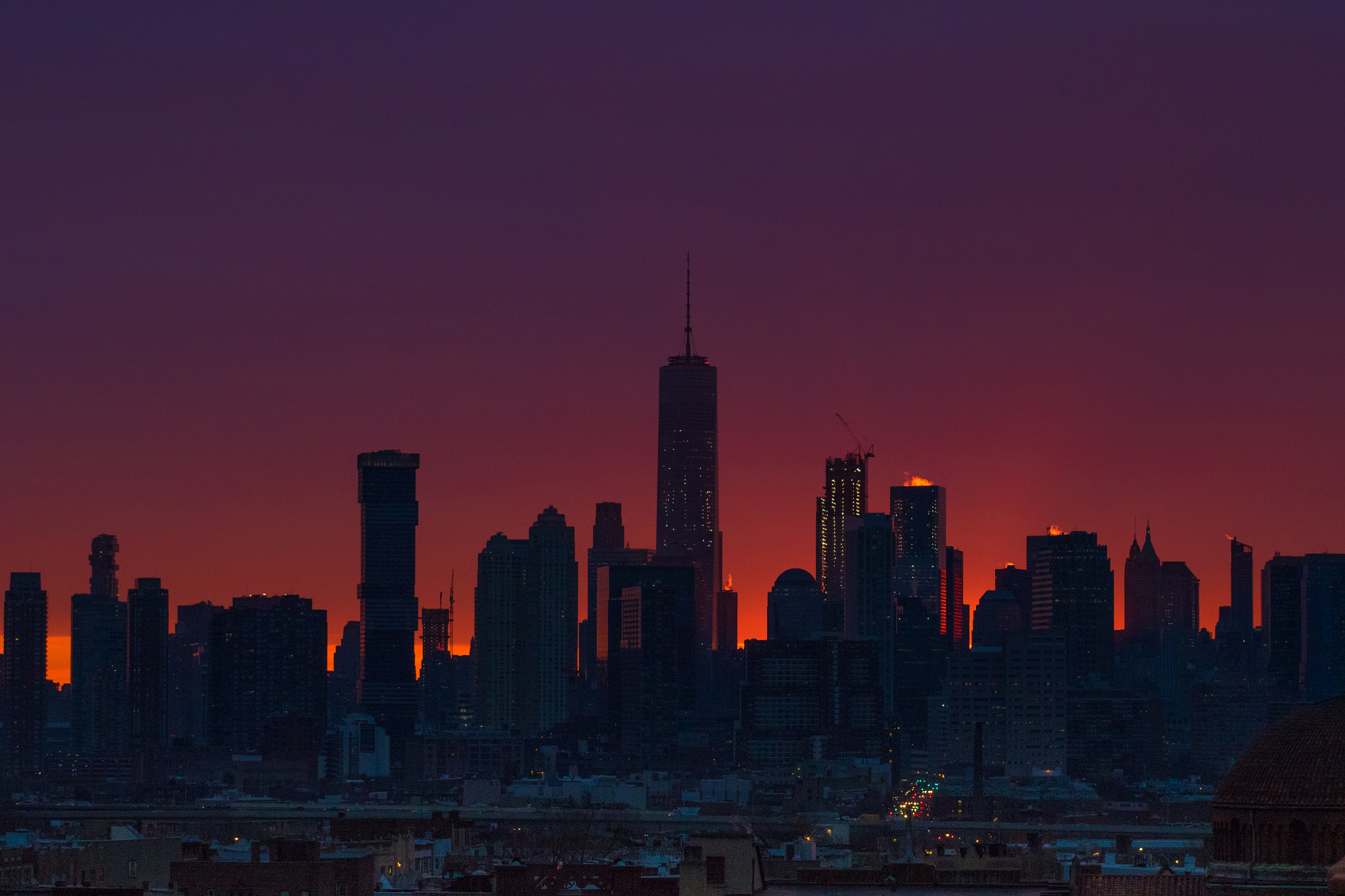 Canon EOS 7D Mark II + EF75-300mm f/4-5.6 sample photo. Manhattan skyline silhouette just before sunrise photography