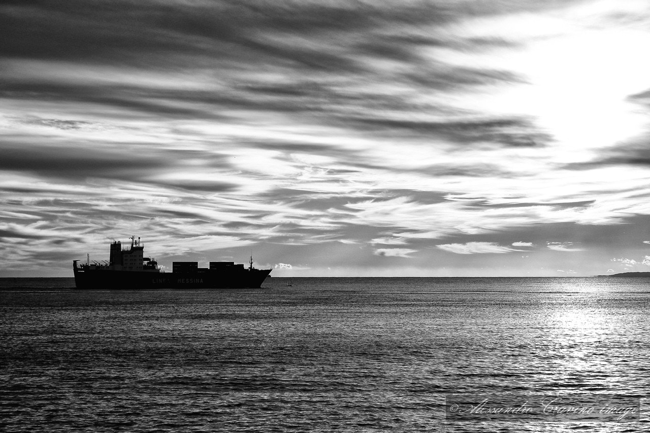 Canon EF-S 18-55mm F3.5-5.6 IS sample photo. Ship at sunset photography