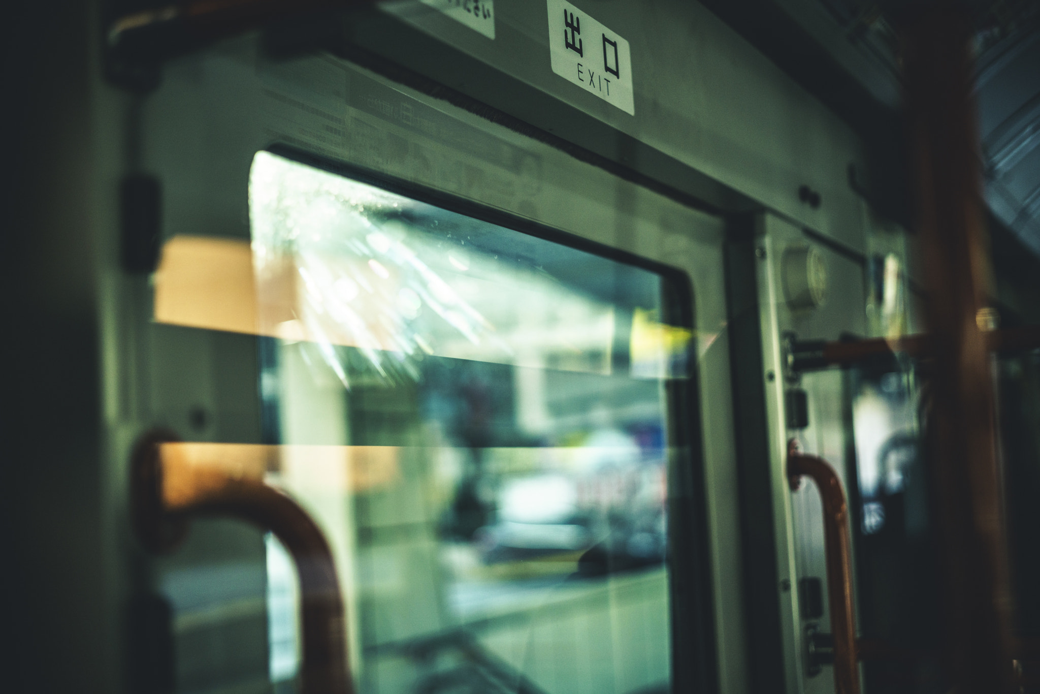 E 50mm F2 sample photo. Exit of bus photography