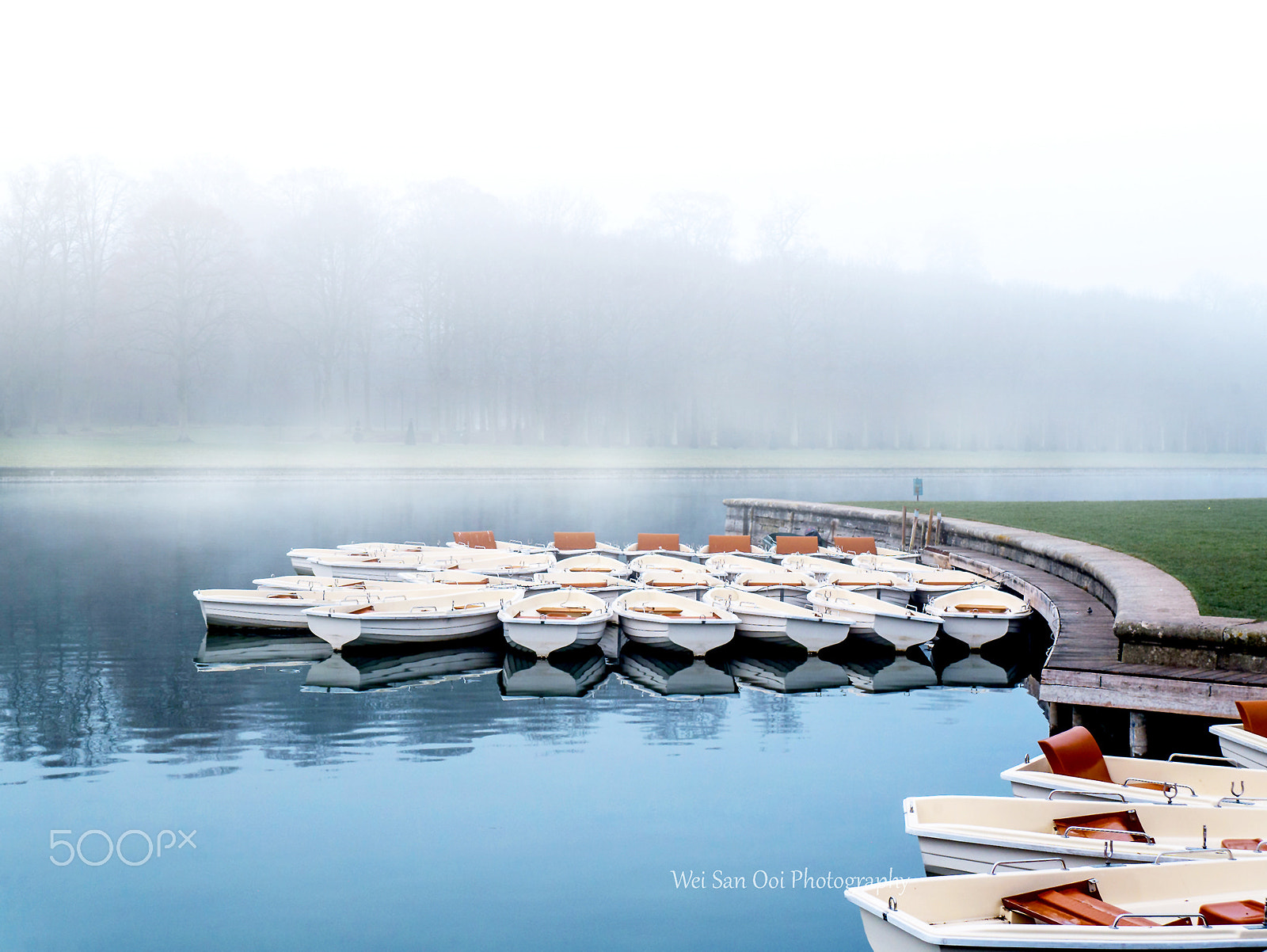 Panasonic Lumix DMC-GX7 sample photo. Canoes on a foggy lake 02 photography