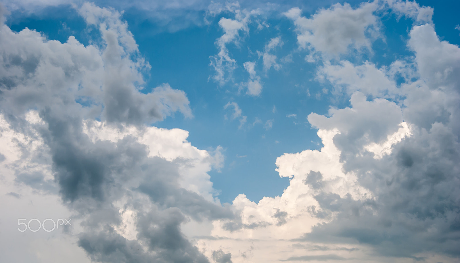 Nikon D3000 sample photo. Blue sky and various cloud formations photography