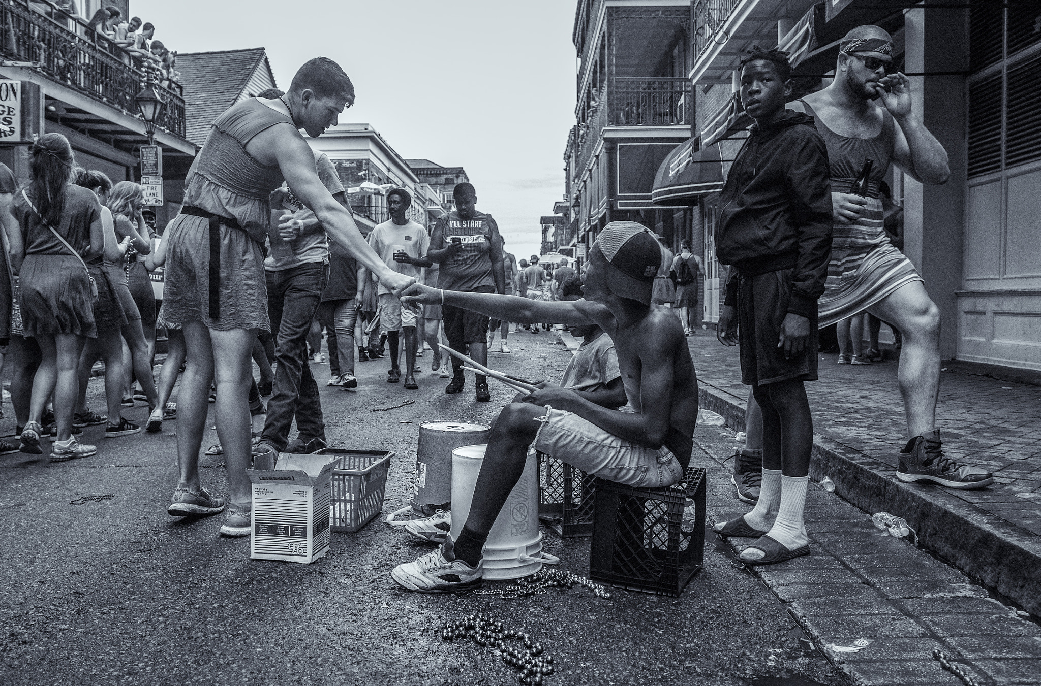 Sigma 18-35mm f/1.8 DC HSM sample photo. Fist bump on bourban street photography