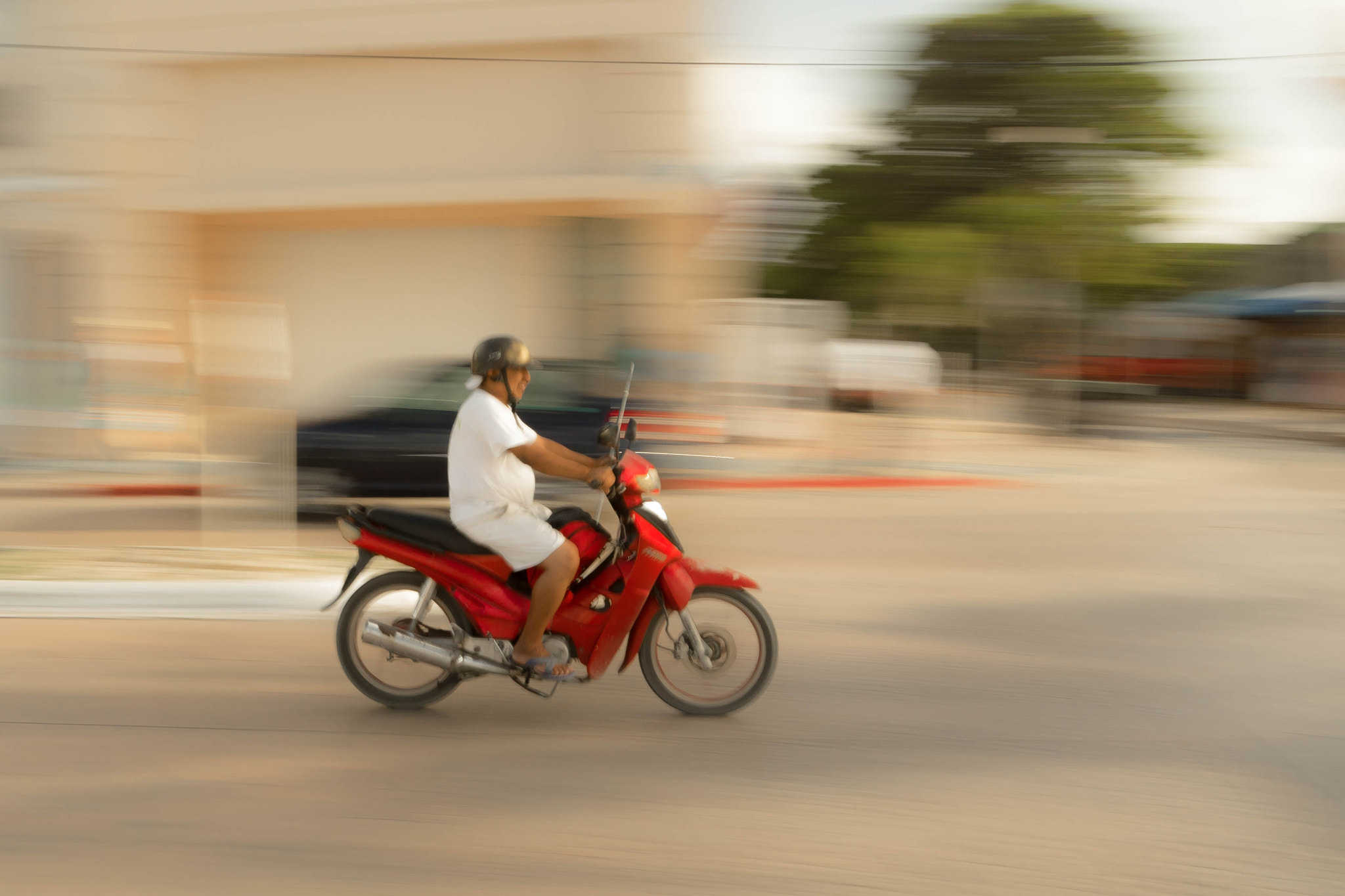 Sony a7R + Sony FE 24-240mm F3.5-6.3 OSS sample photo. Speeding bike photography