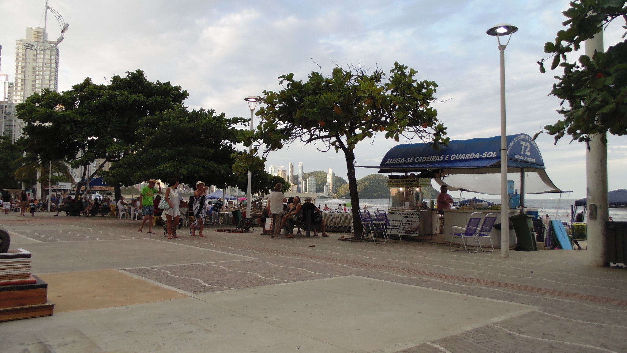 Sony DSC-H100 sample photo. Late afternoon in the square by the sea photography