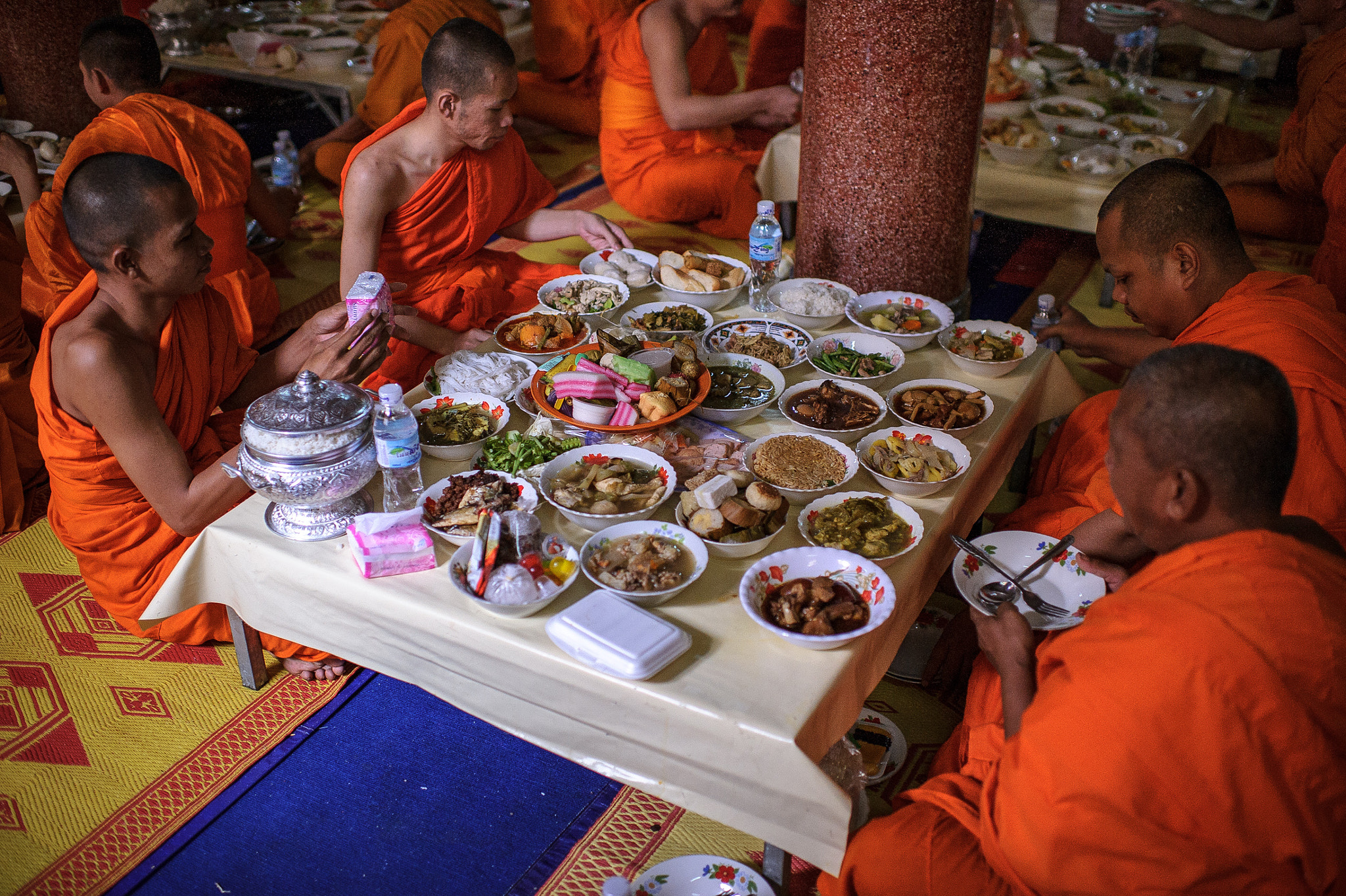Nikon D3S + Nikon AF-S Nikkor 35mm F1.4G sample photo. Munching monks photography