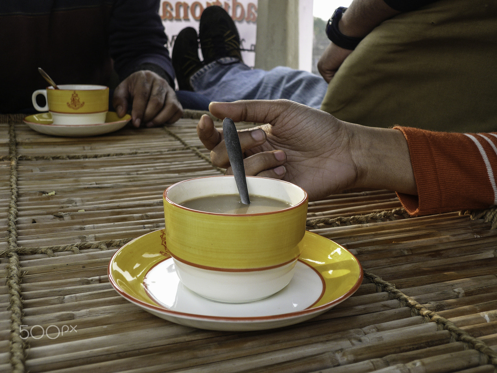 Panasonic DMC-FX100 sample photo. Enjoying a cup of tea kept on a bamboo table photography