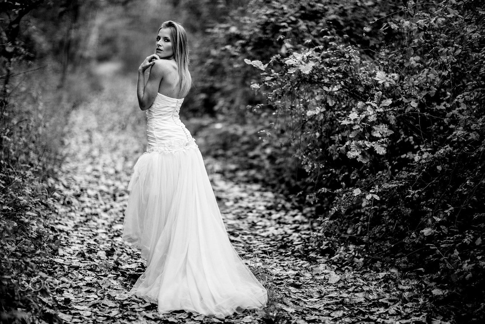 Canon EF 85mm F1.2 sample photo. Back of bride photography