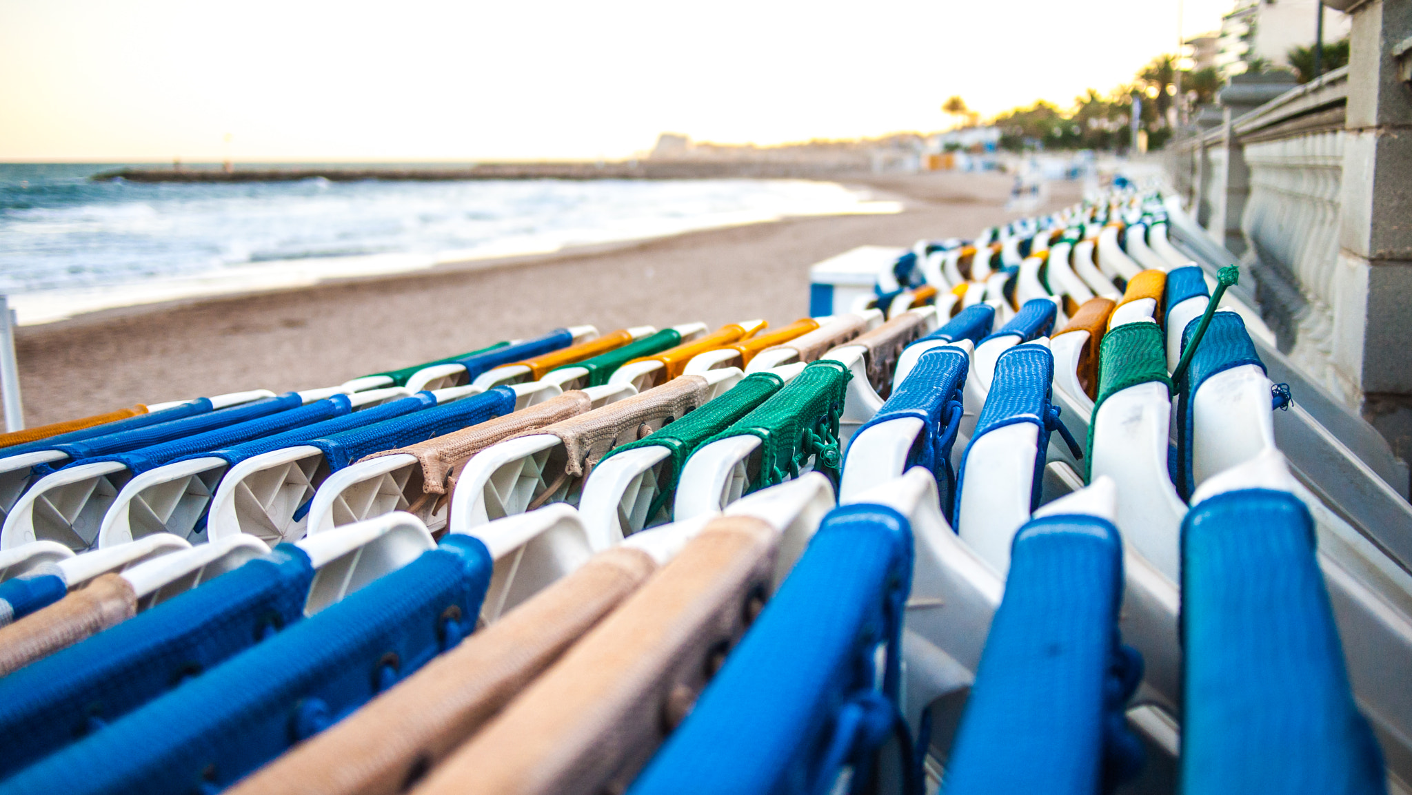 Olympus PEN E-P1 + Panasonic Lumix G 20mm F1.7 ASPH sample photo. Chairs on the beach photography