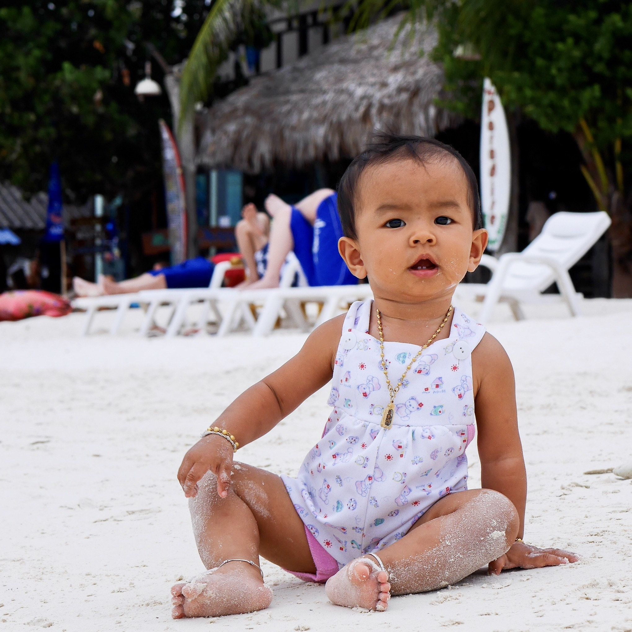 Panasonic Lumix DMC-GF8 + Panasonic Lumix G 42.5mm F1.7 ASPH Power OIS sample photo. Thai baby - crawling at the beach photography