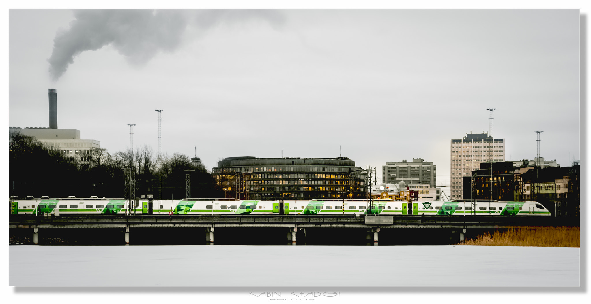 LUMIX G VARIO 12-60/F3.5-5.6 sample photo. The train on frozen lake photography