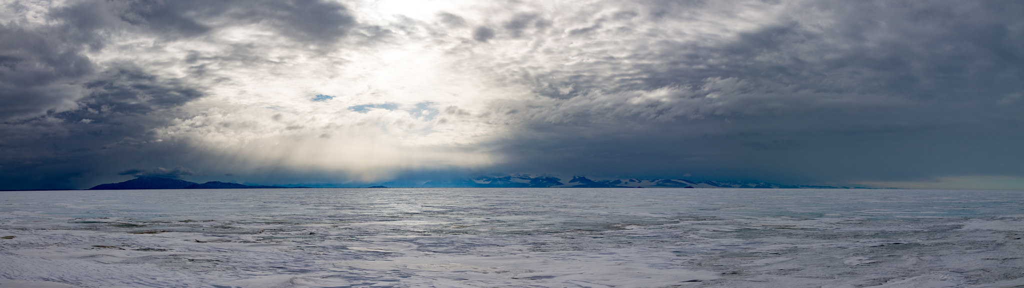 Canon EOS 1100D (EOS Rebel T3 / EOS Kiss X50) sample photo. Cloudy day on the ice photography