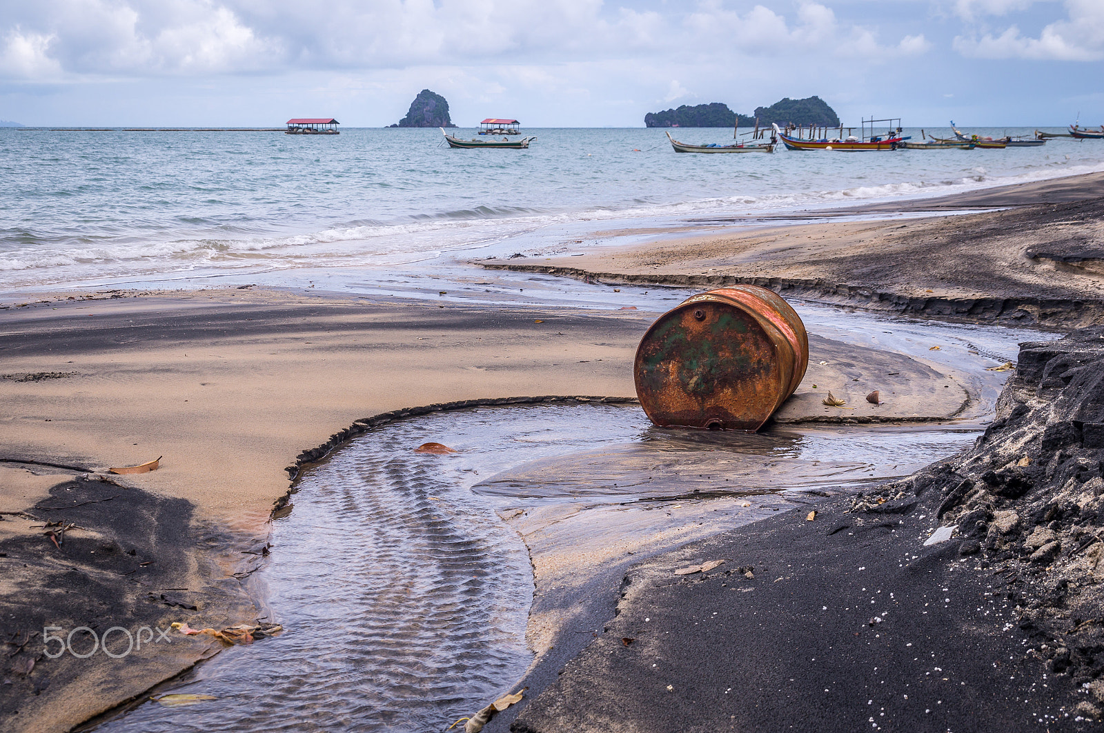 Sony SLT-A37 sample photo. Old rusty barrel oil on beach in asia photography