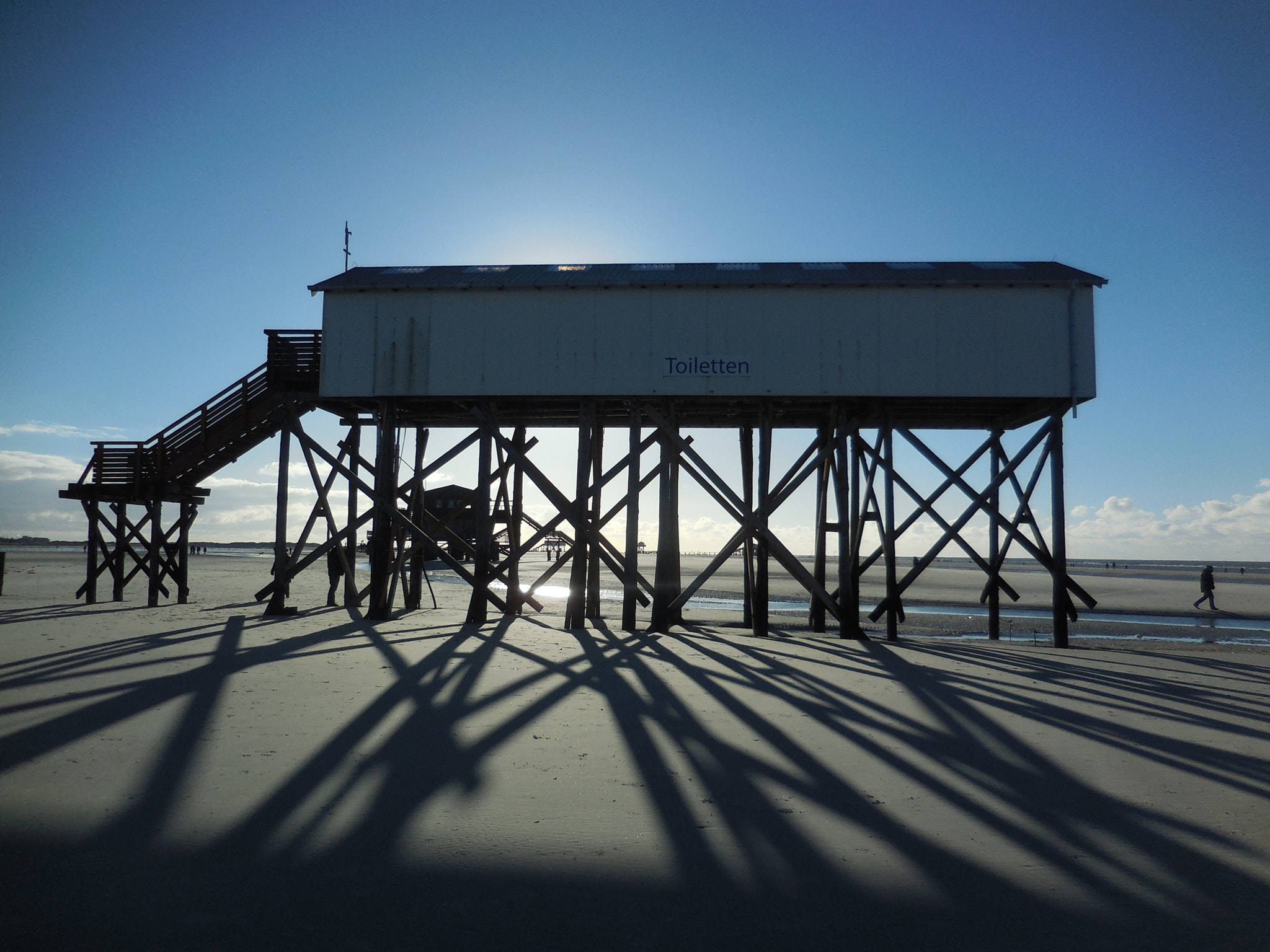 Nikon COOLPIX S6600 sample photo. Stilt house shadows photography