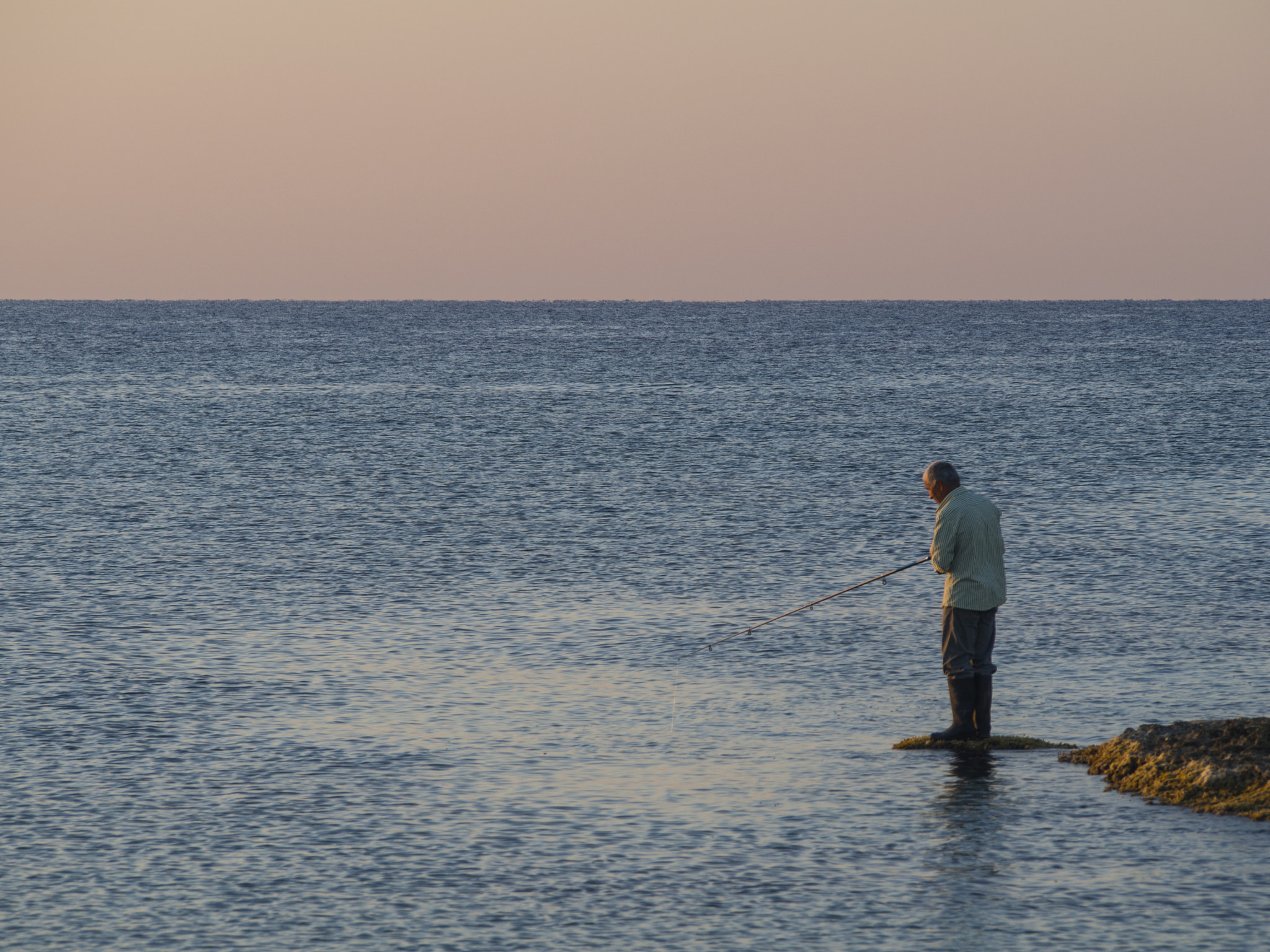 Olympus PEN E-PL6 sample photo. Fisherman photography