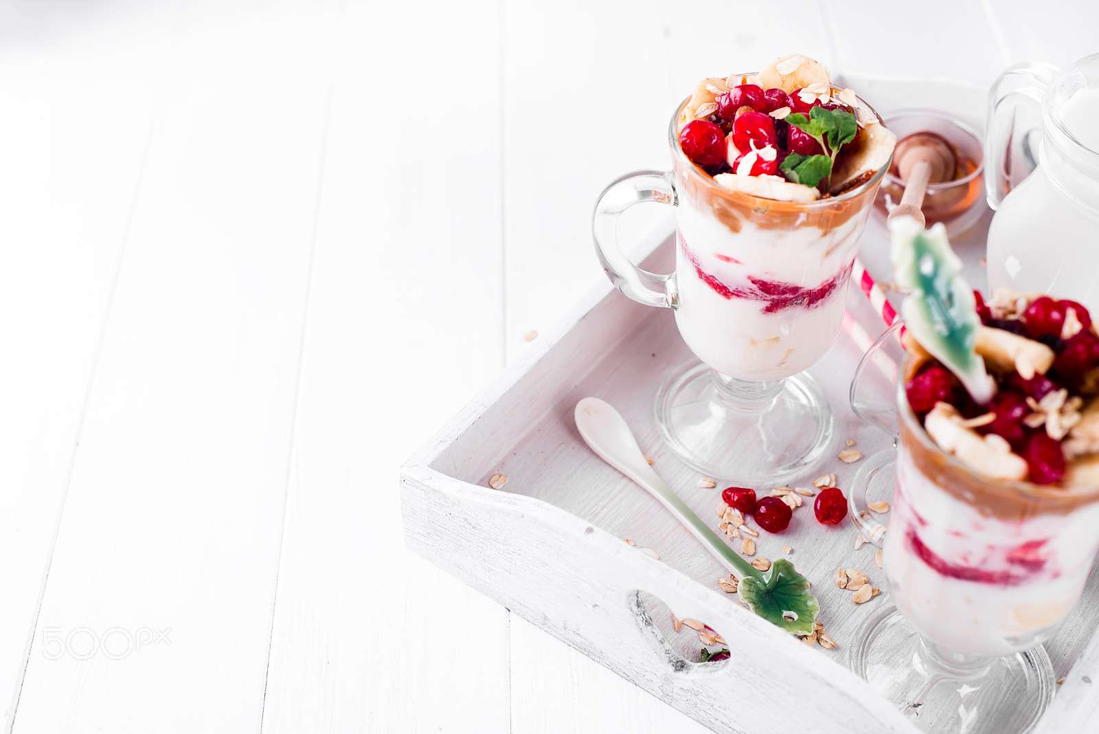 Nikon D610 + AF Nikkor 50mm f/1.8 sample photo. Dessert in a glass on a wooden tray photography