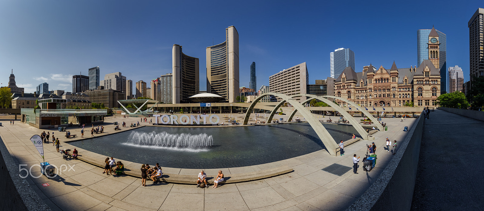 Canon EOS 550D (EOS Rebel T2i / EOS Kiss X4) + Canon EF-S 10-22mm F3.5-4.5 USM sample photo. Toronto city hall @ nathan phillips square photography
